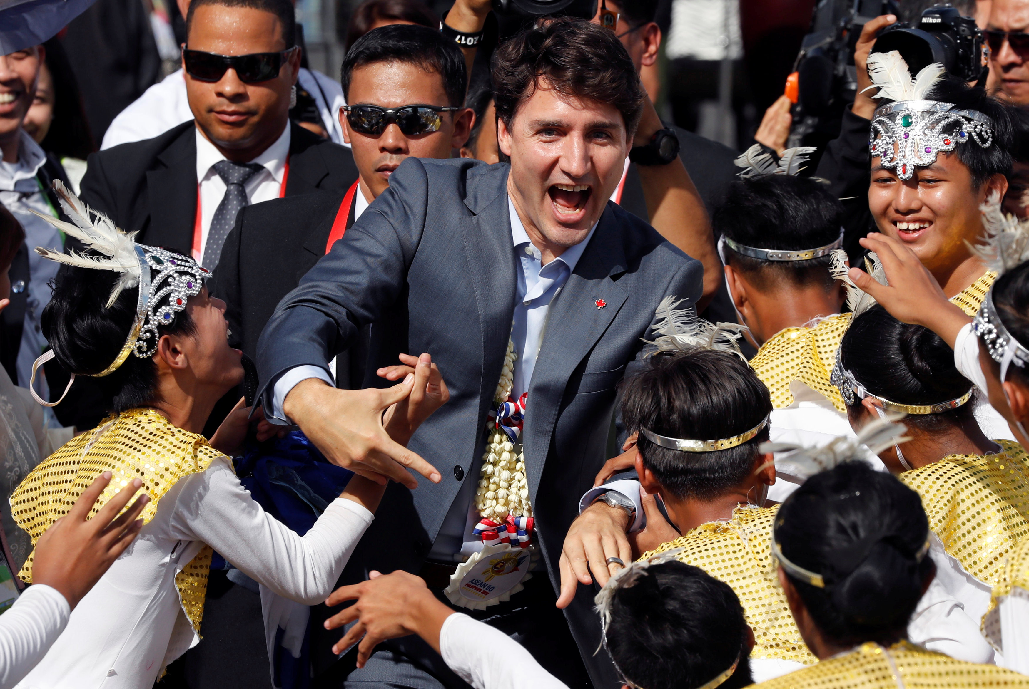Canada's Prime Minister Justin Trudeau charms Manila while ordering fried chicken
