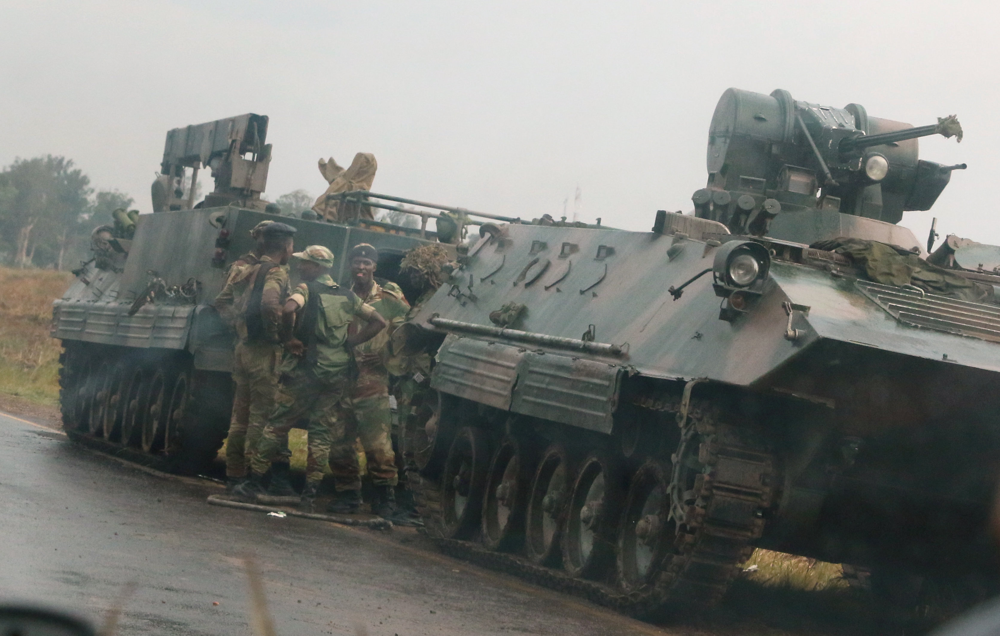 Tanks seen near Zimbabwe capital but streets calm as political tensions rise