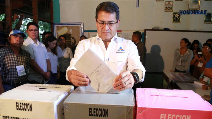 President strong as Hondurans vote, but critics fear power grab