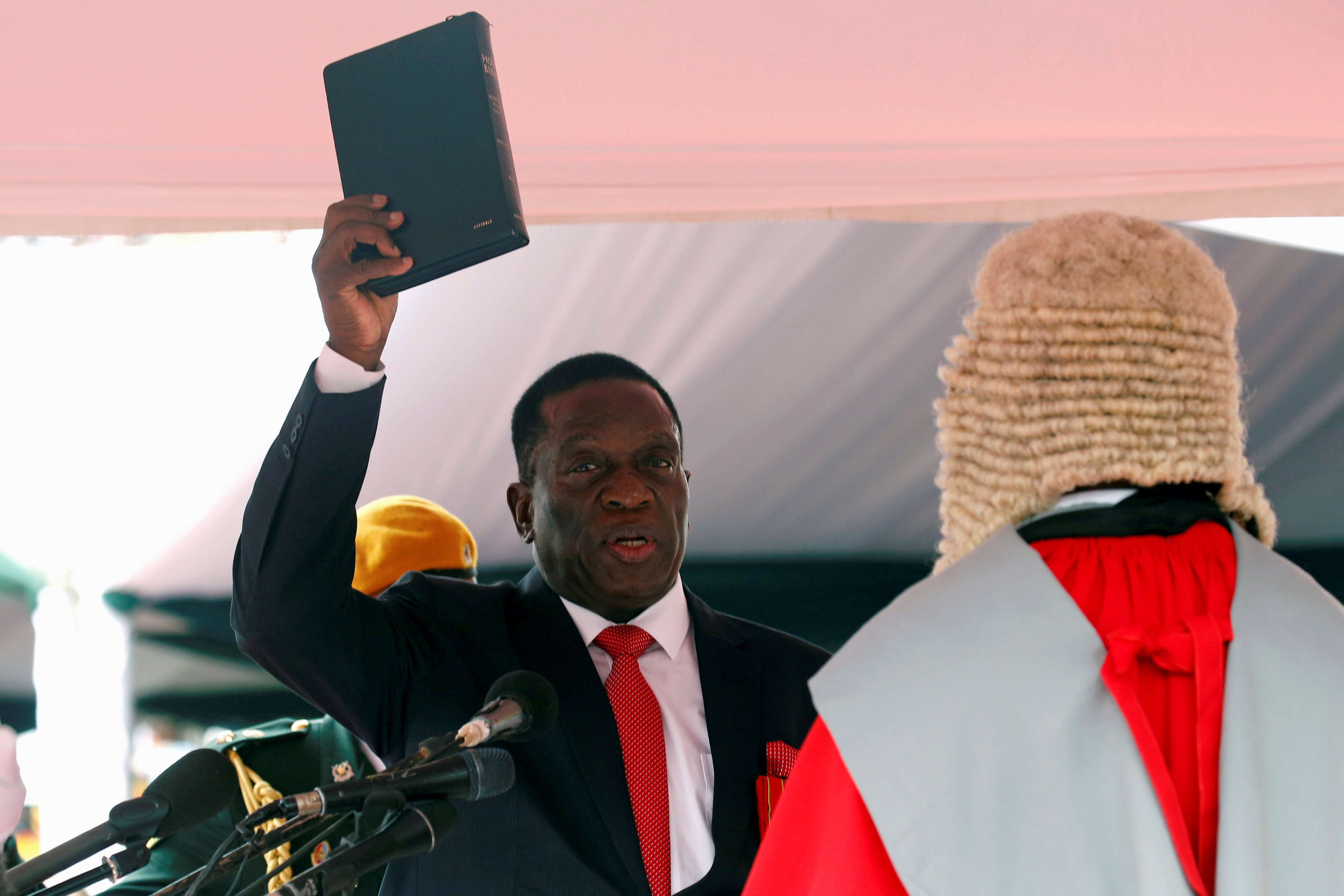 Zimbabwe's new president dissolves Mugabe cabinet