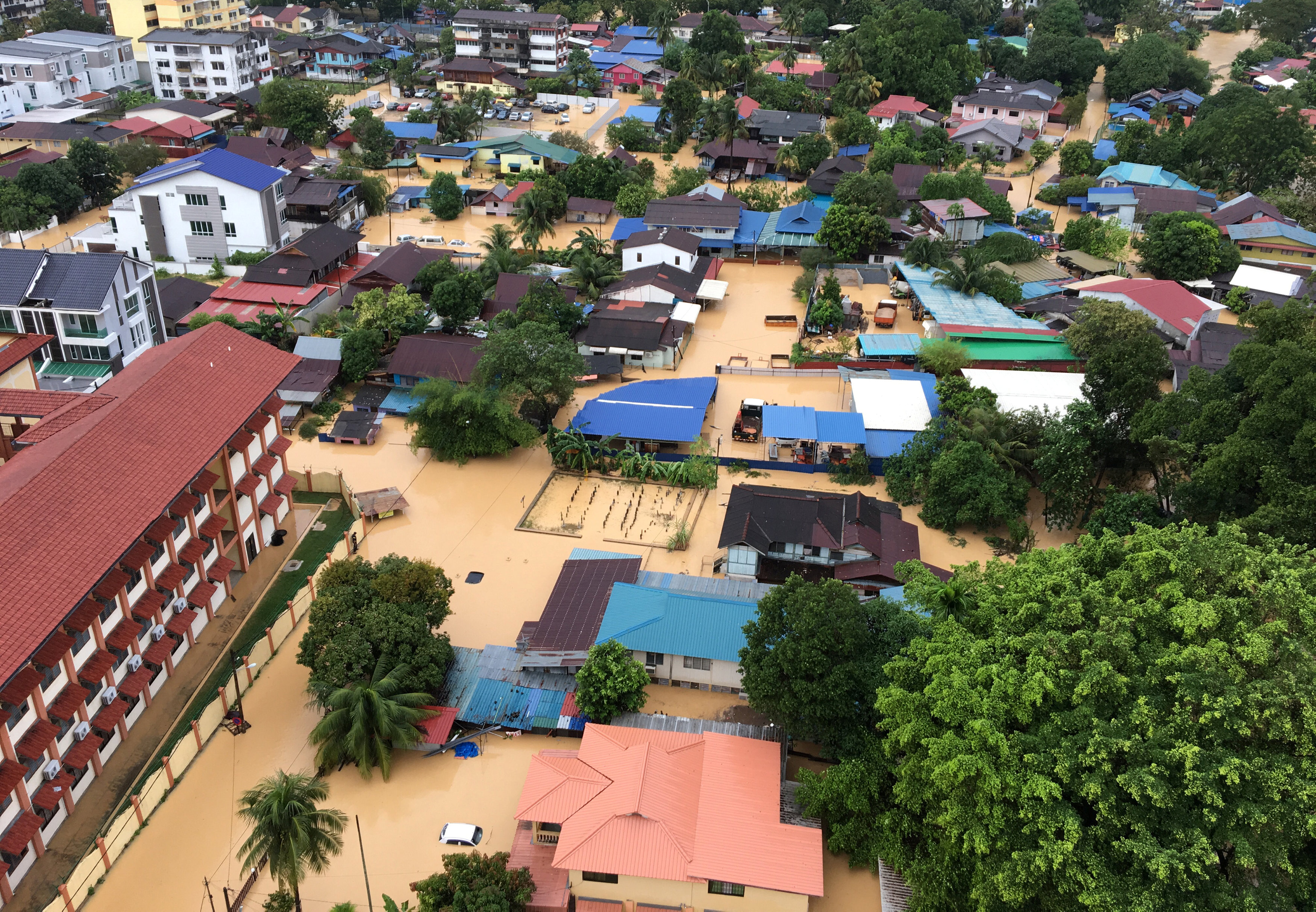 In pictures: Floods displace thousands in Malaysia's Penang