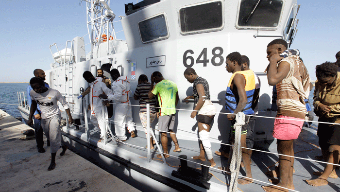 Five migrants die when boat sinks, Libyan coast guard and German NGO blame each other