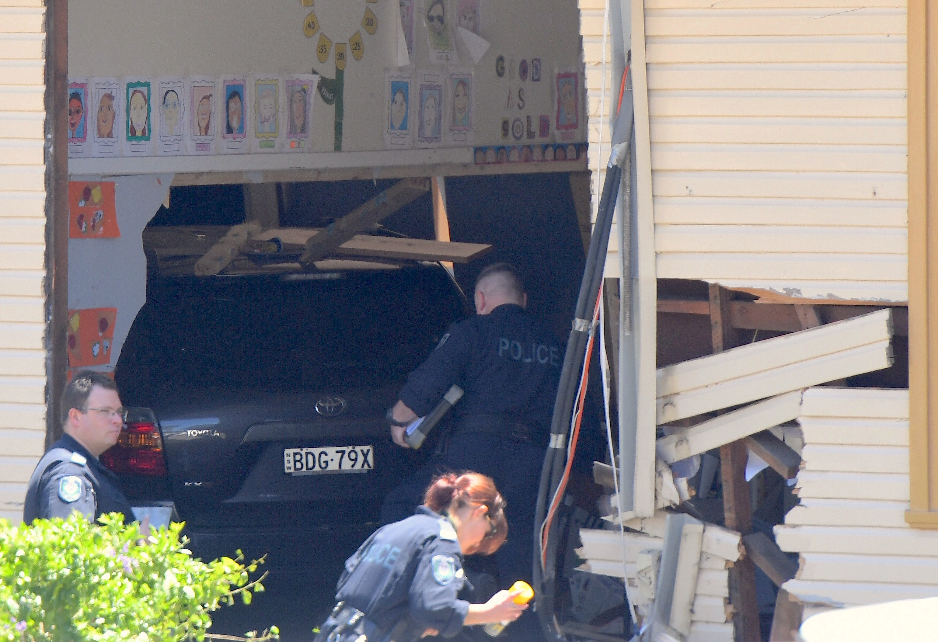 Two children killed as car crashes into Sydney school classroom