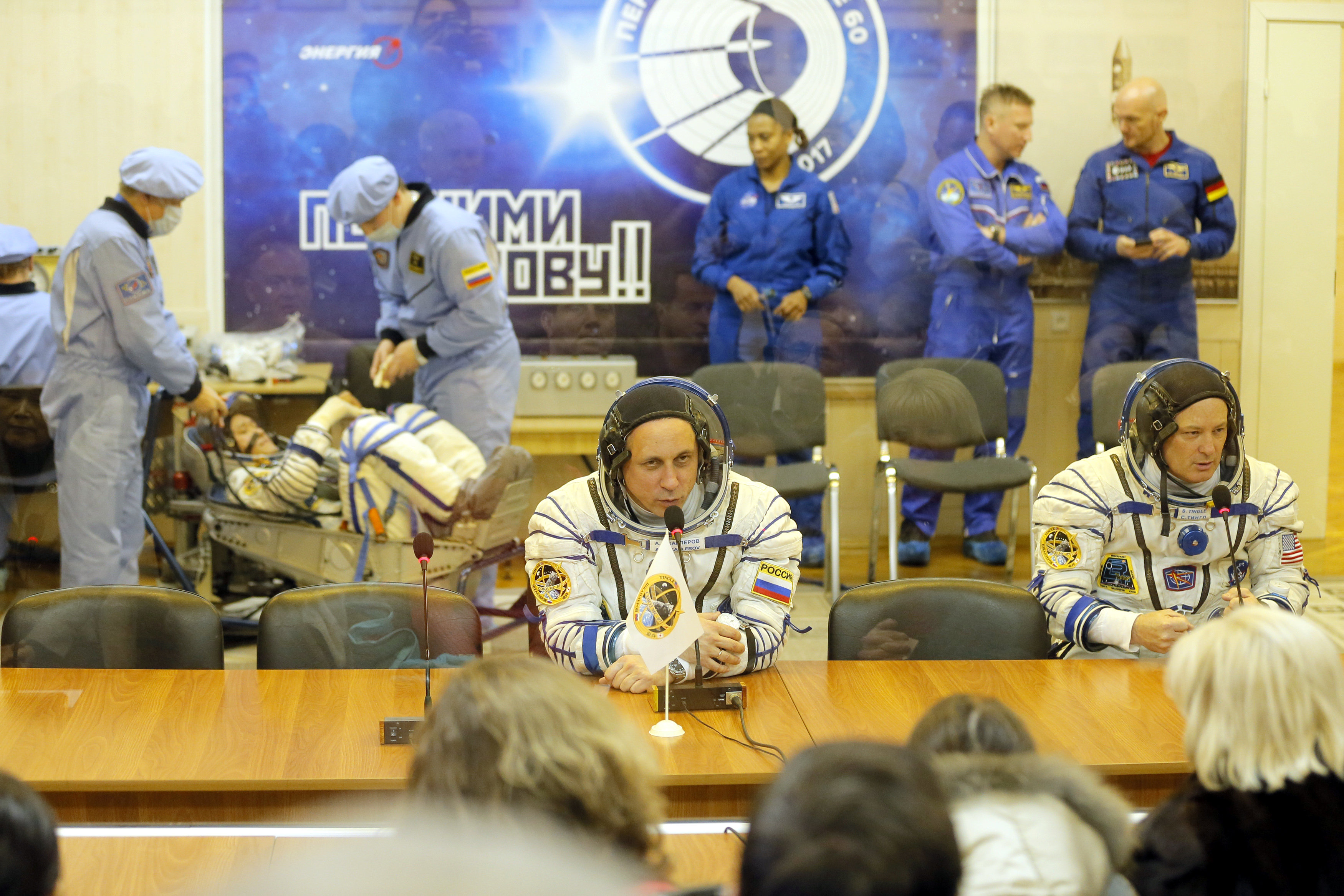 In pictures: U.S., Russian, Japanese crew blasts off for space station