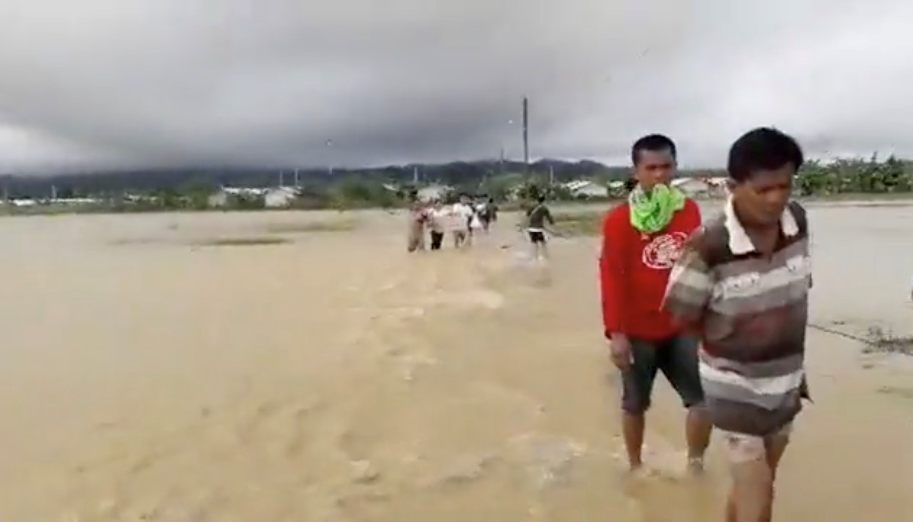 In pictures: Philippine storm triggers floods, landslides