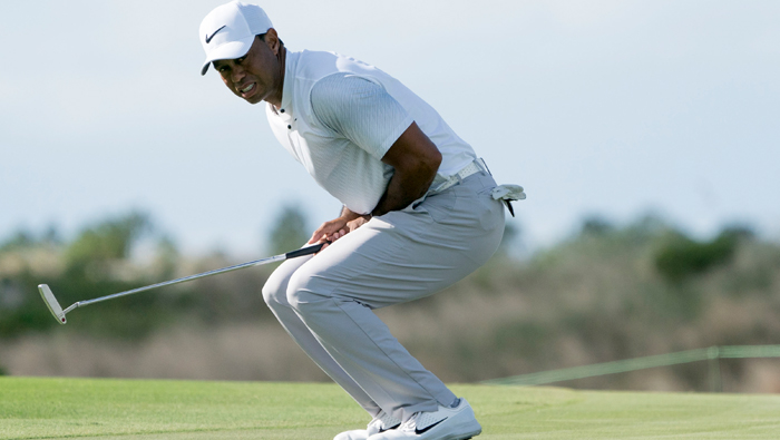 Golf: Woods tied for fifth in comeback
