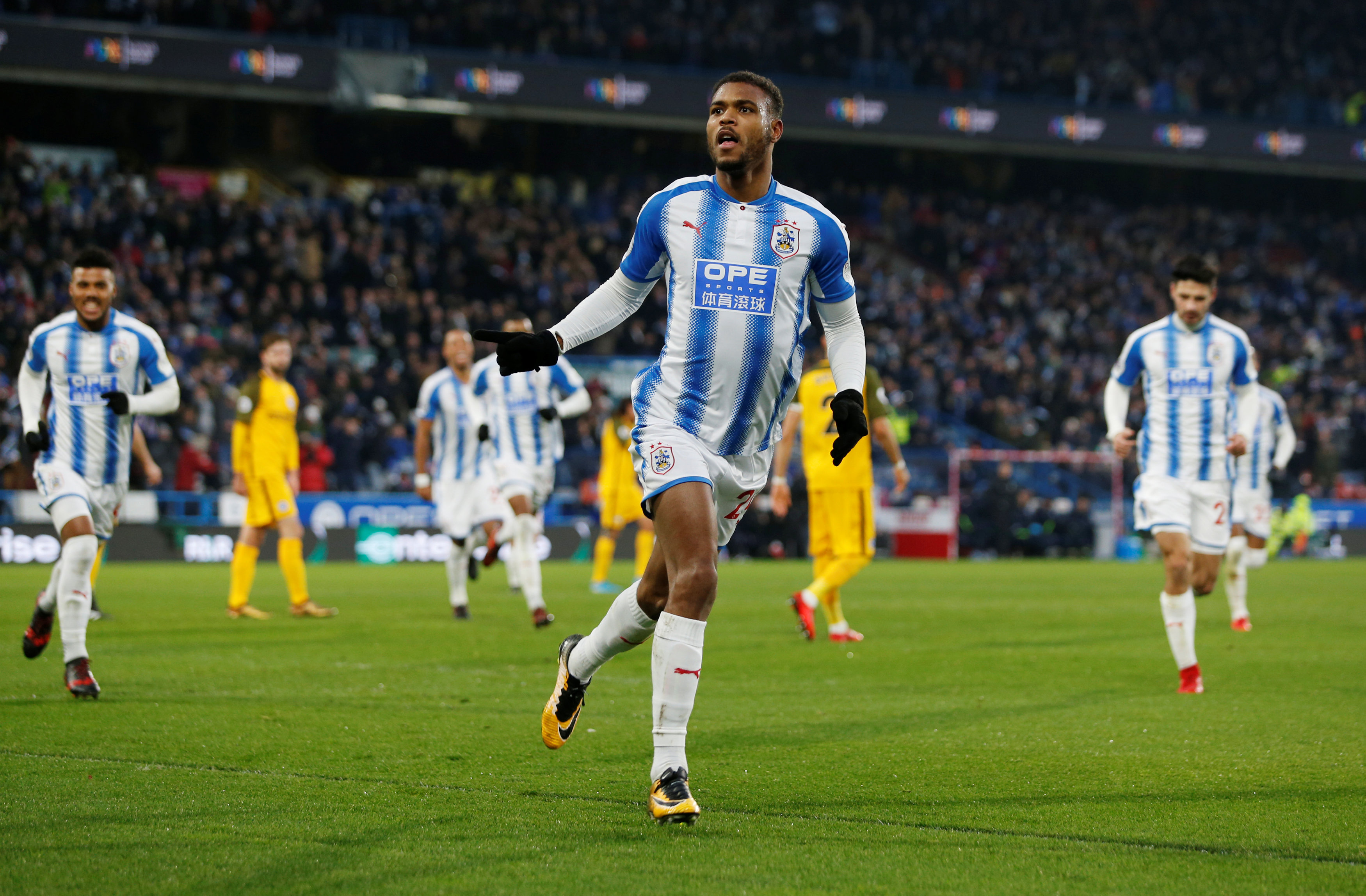 Football: Mounie double lifts Huddersfield against Brighton
