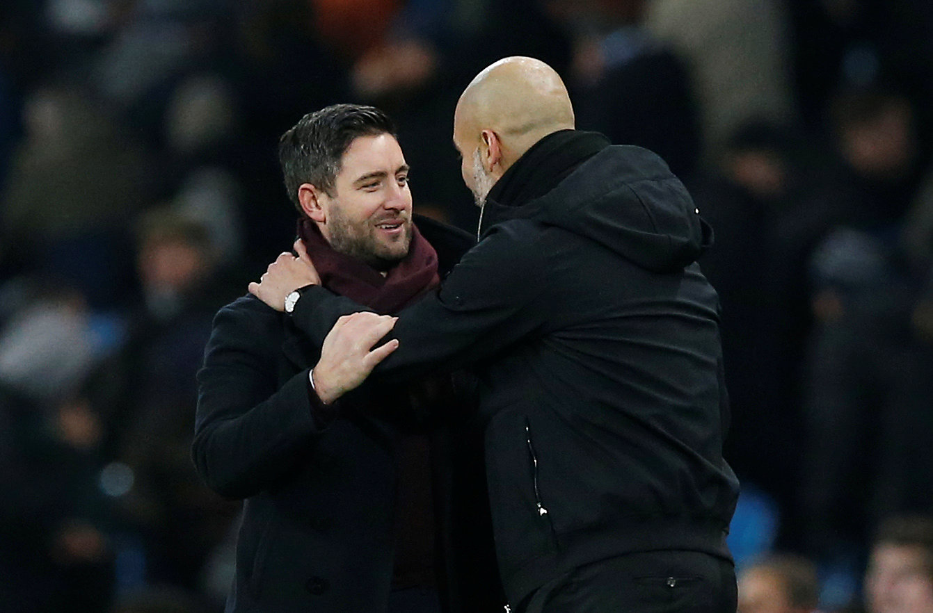 Football: Guardiola consoles Bristol City boss after Aguero's late winner