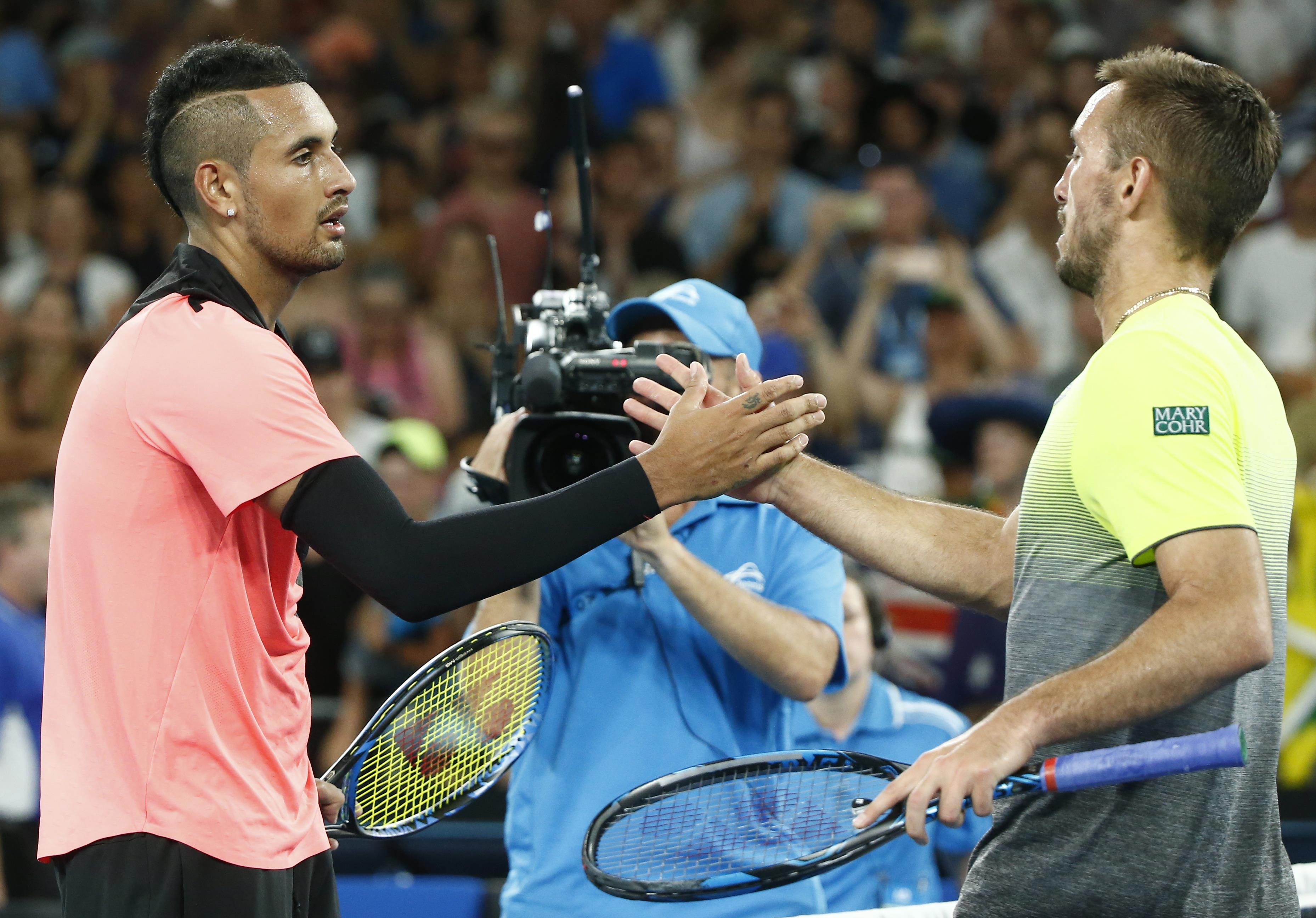 Tennis: Kyrgios keeps cool to storm into third round