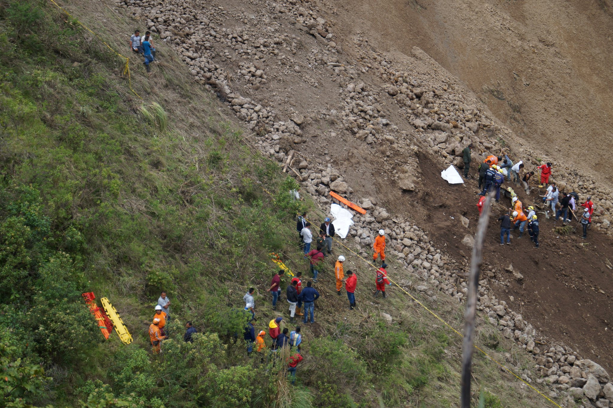 13 killed as landslide pushes bus into ravine in Colombia
