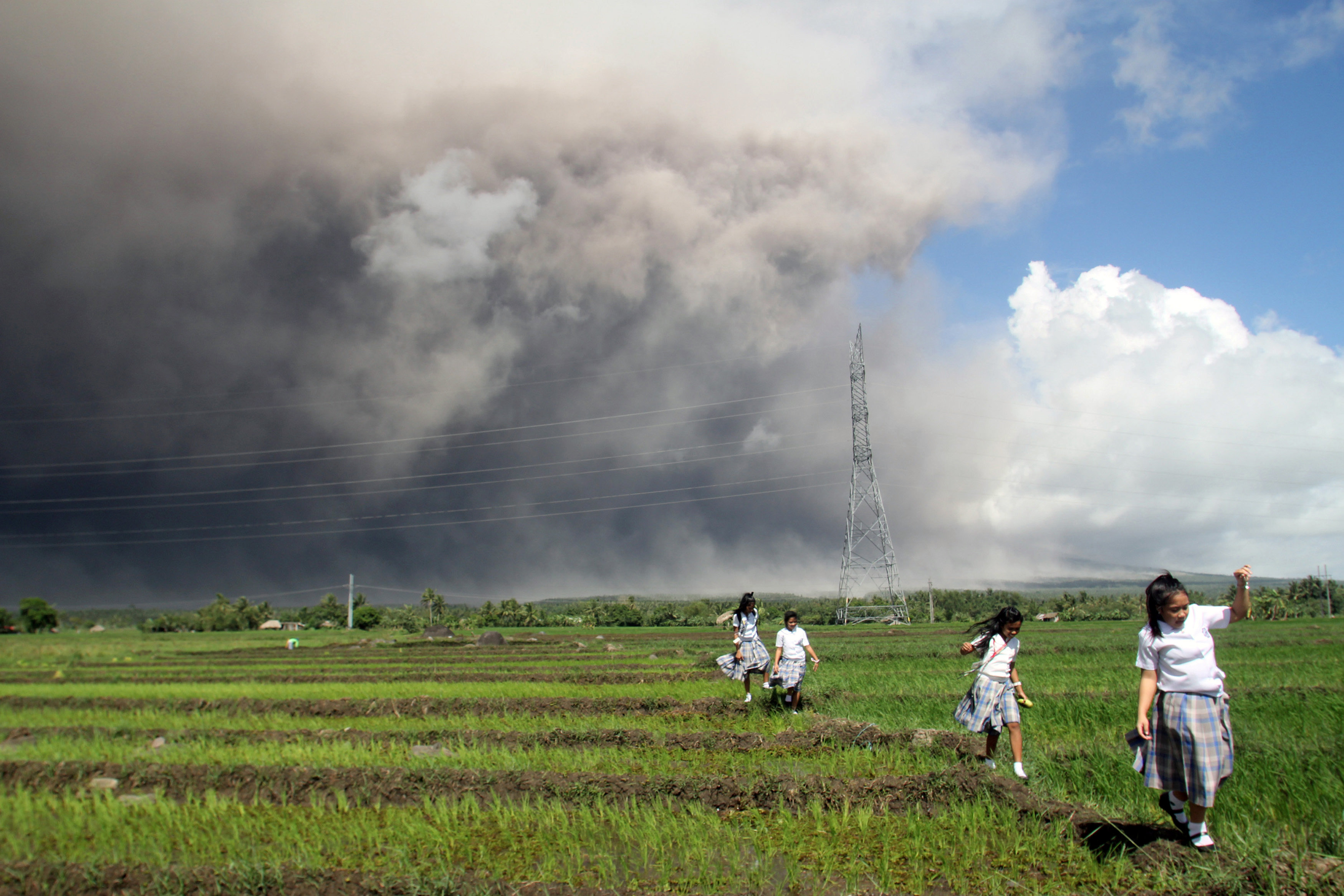 In pictures: People flee as Philippine volcano spews heavy ash