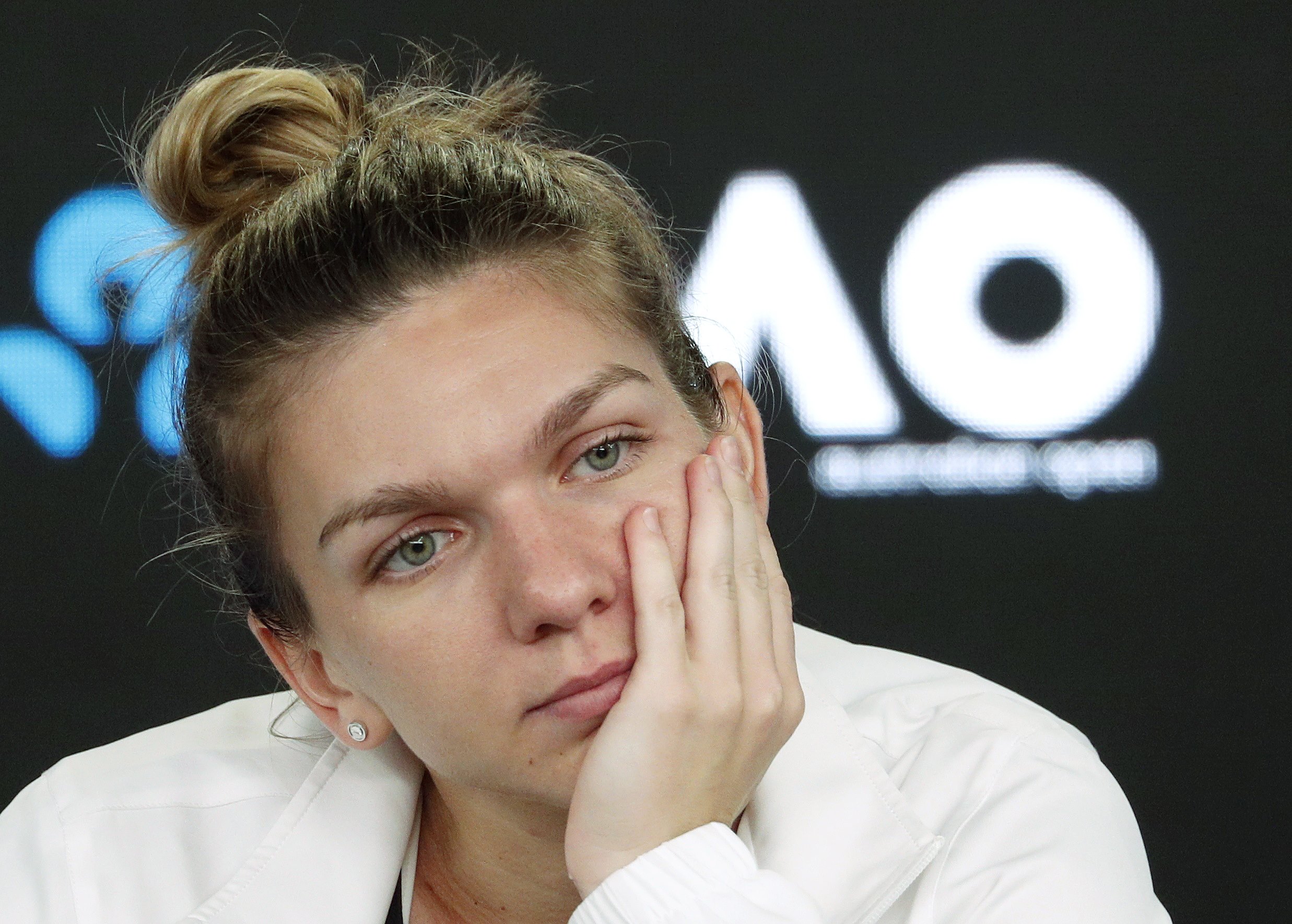 Tennis: No escapes for brave Halep in third Grand Slam final