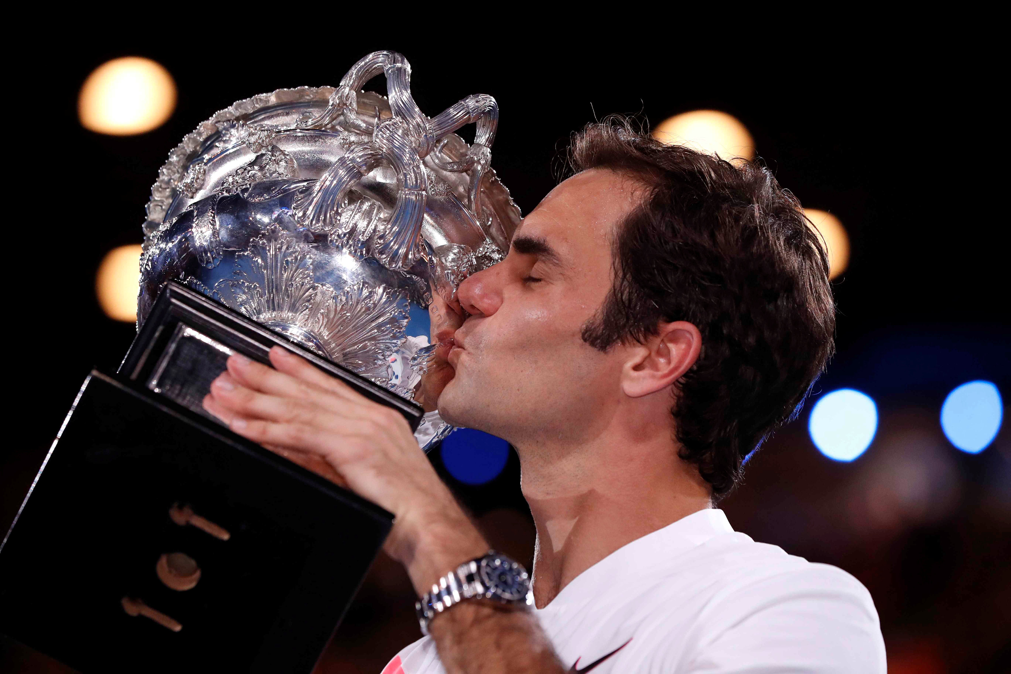 Federer fights off Cilic to win 20th Grand Slam title