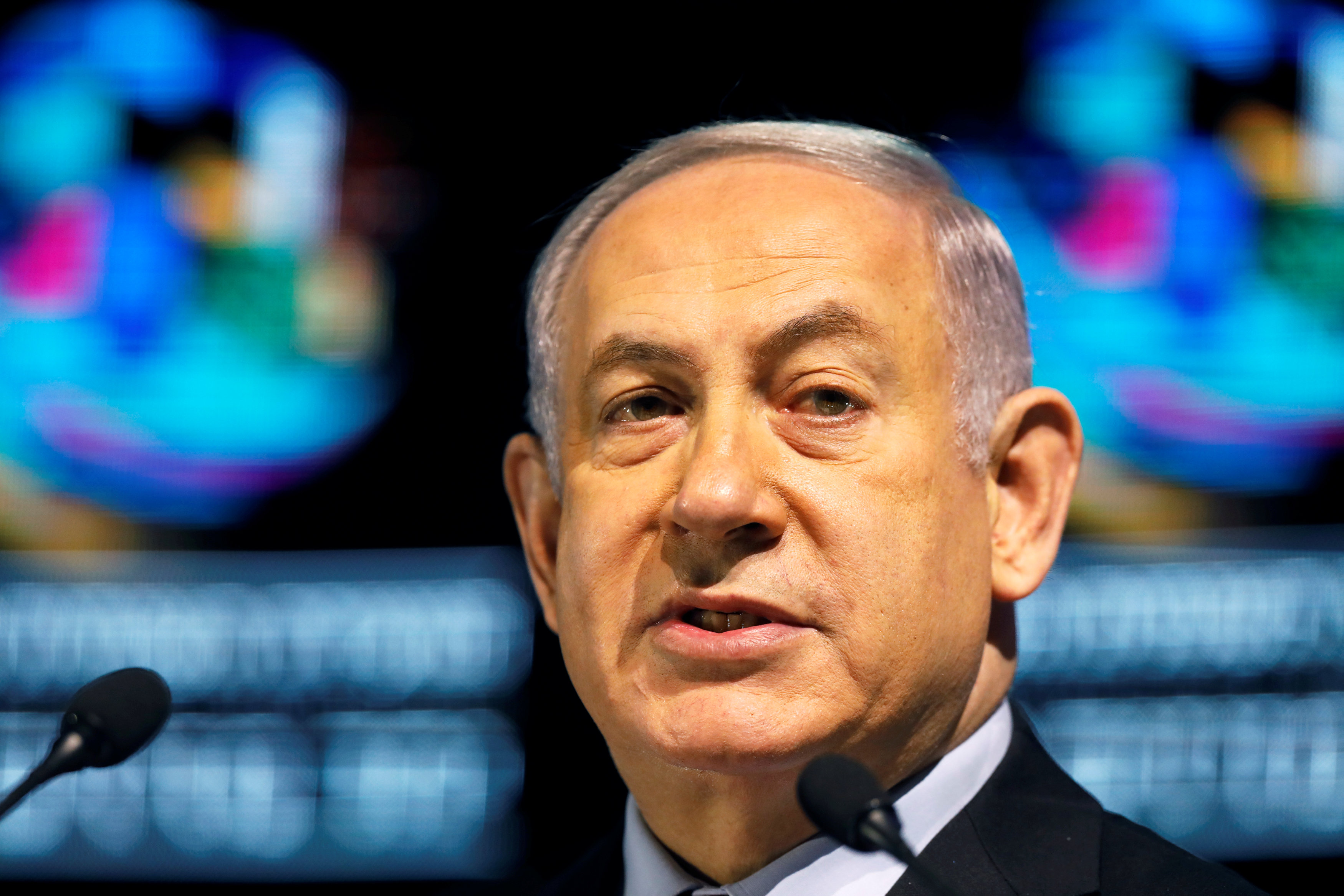 Following bribery allegations, coalition to stick with Netanyahu