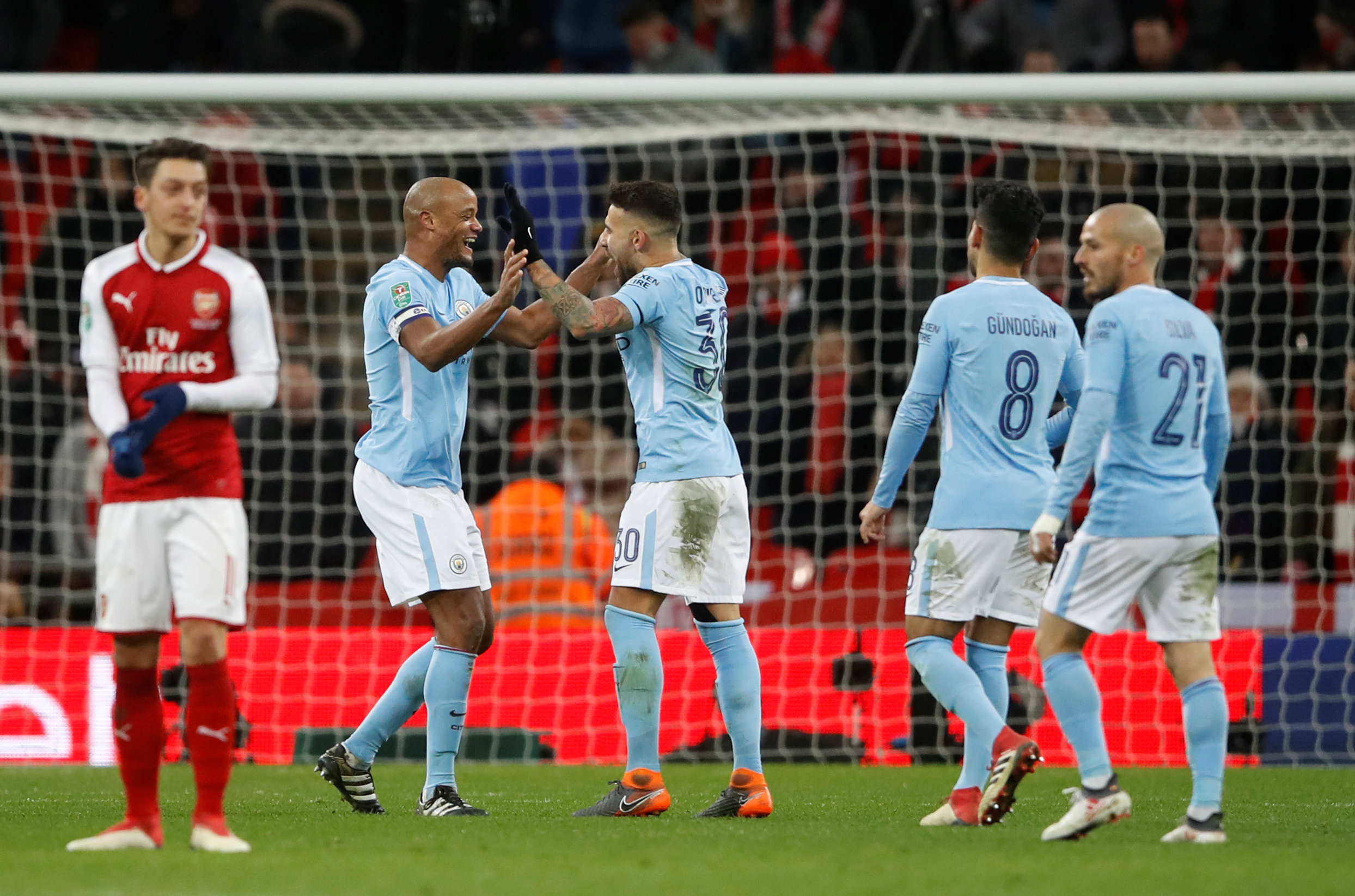 Football: Man City rout Arsenal to lift League Cup