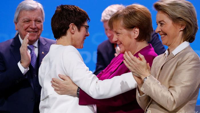Merkel wins party nod to renew coalition with SPD