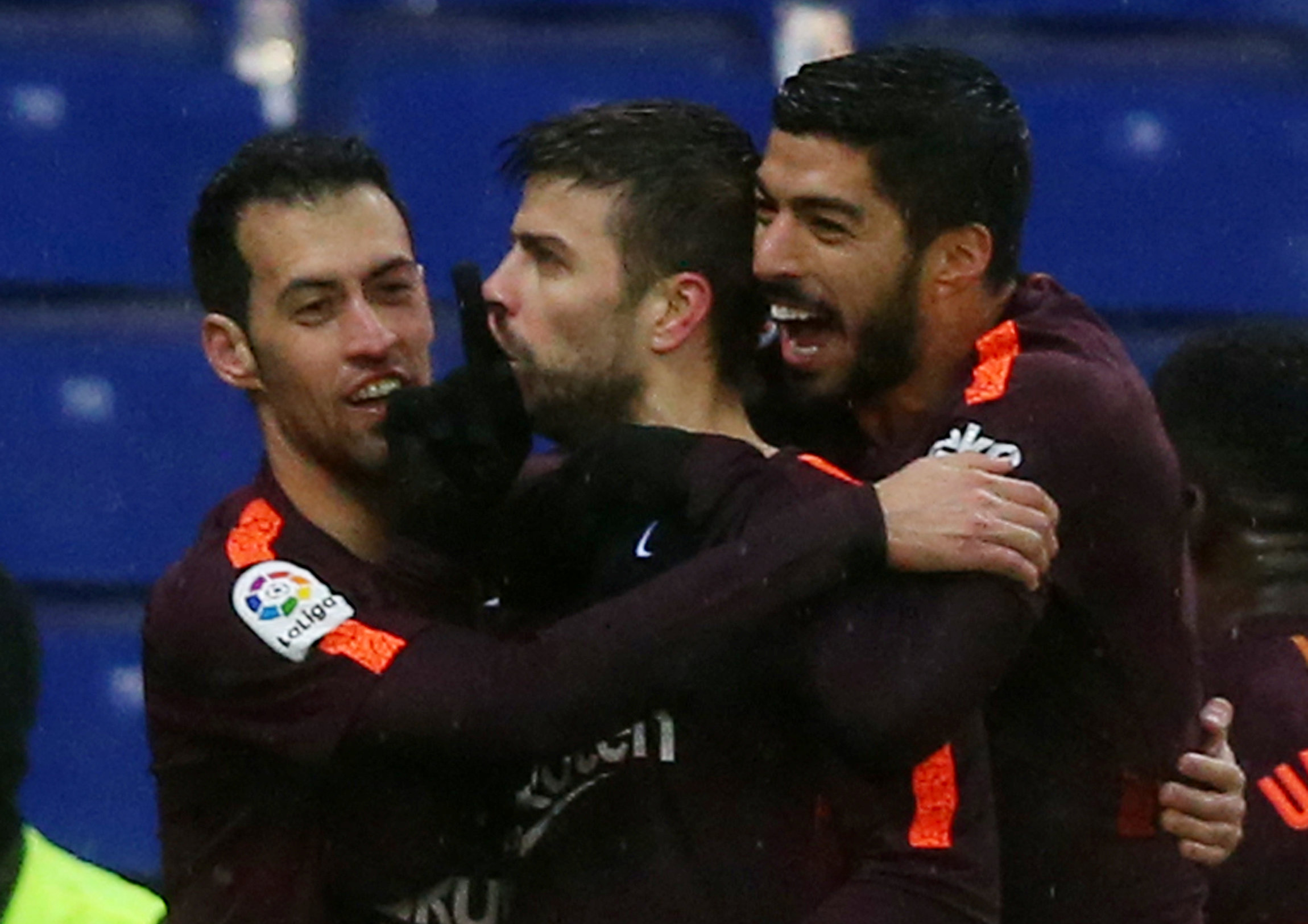 Football: Pique scores as Barca hold Espanyol