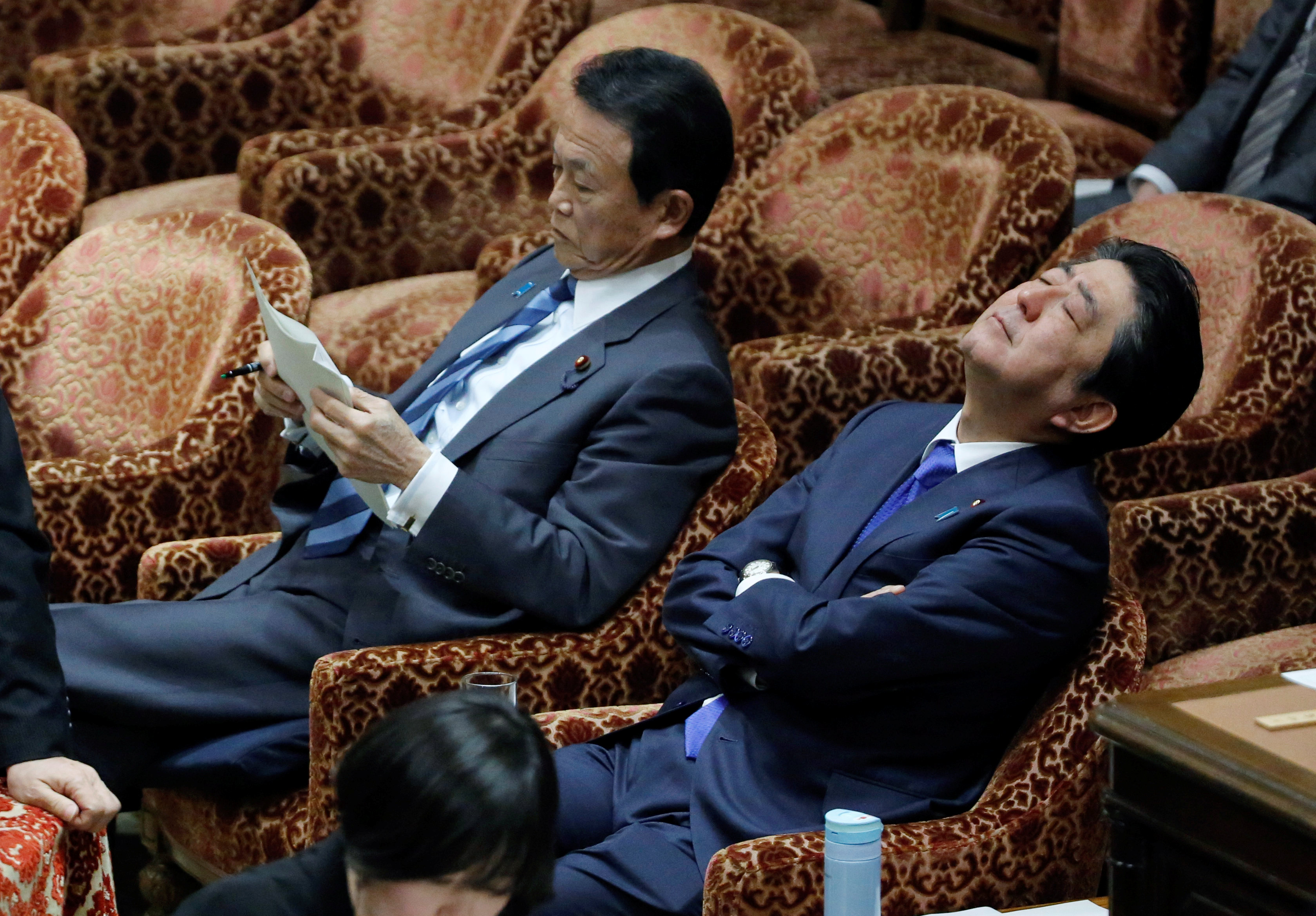 Japanese premier, finance minister face pressure over suspected cronyism scandal