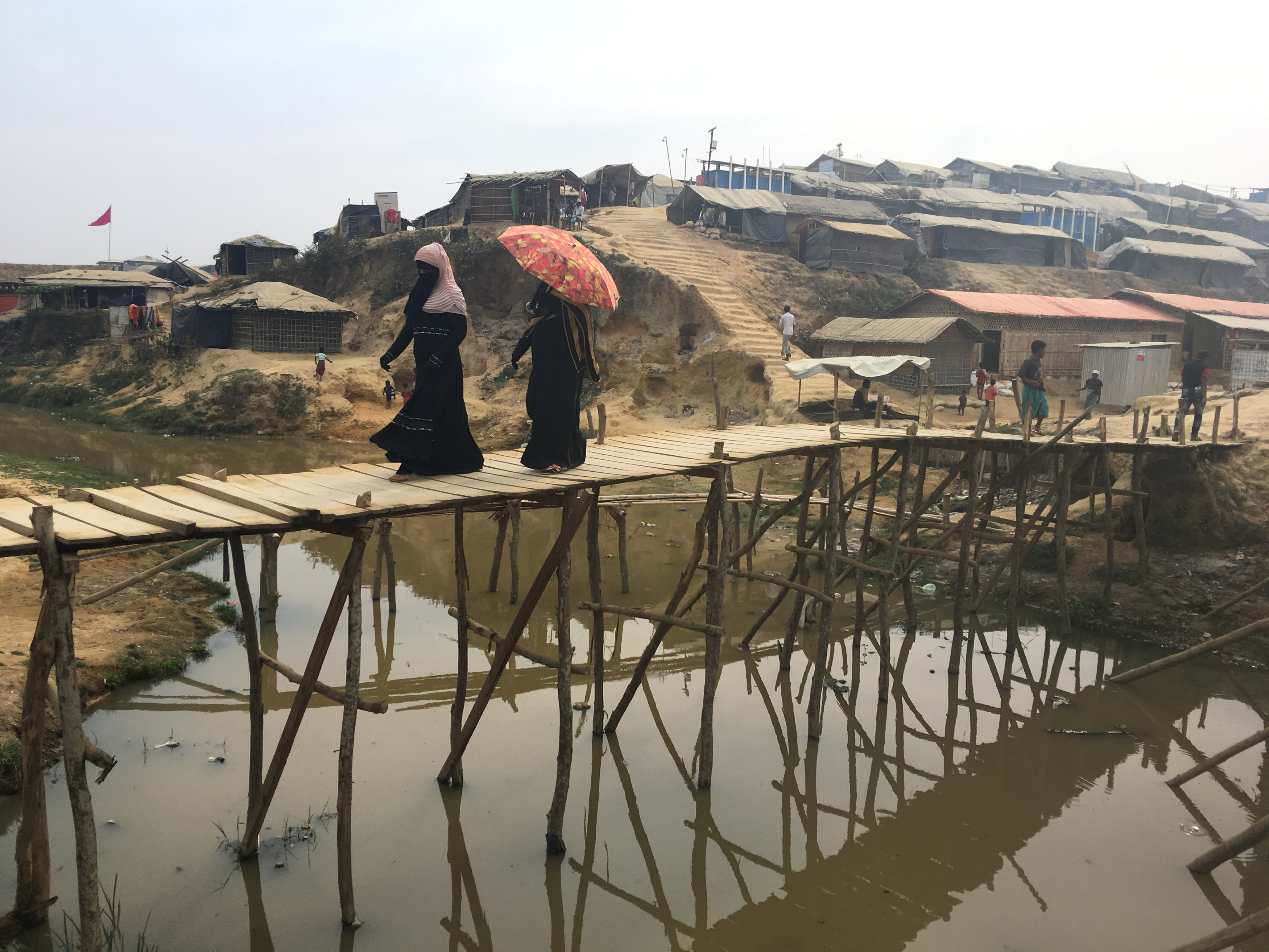Monsoon floods, landslides threaten 100,000 Rohingya refugees in Bangladesh