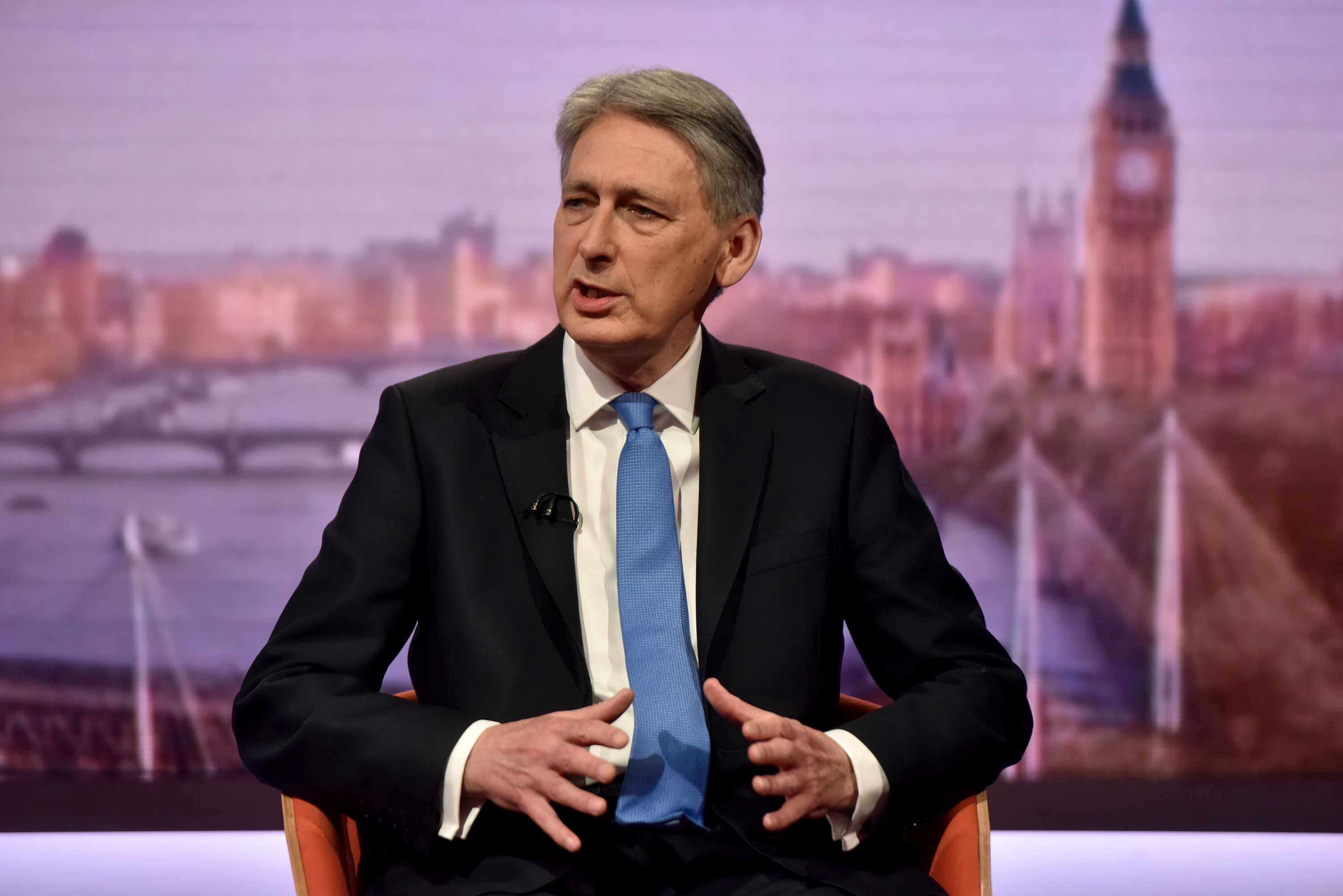 UK's Hammond sees light at end of austerity tunnel