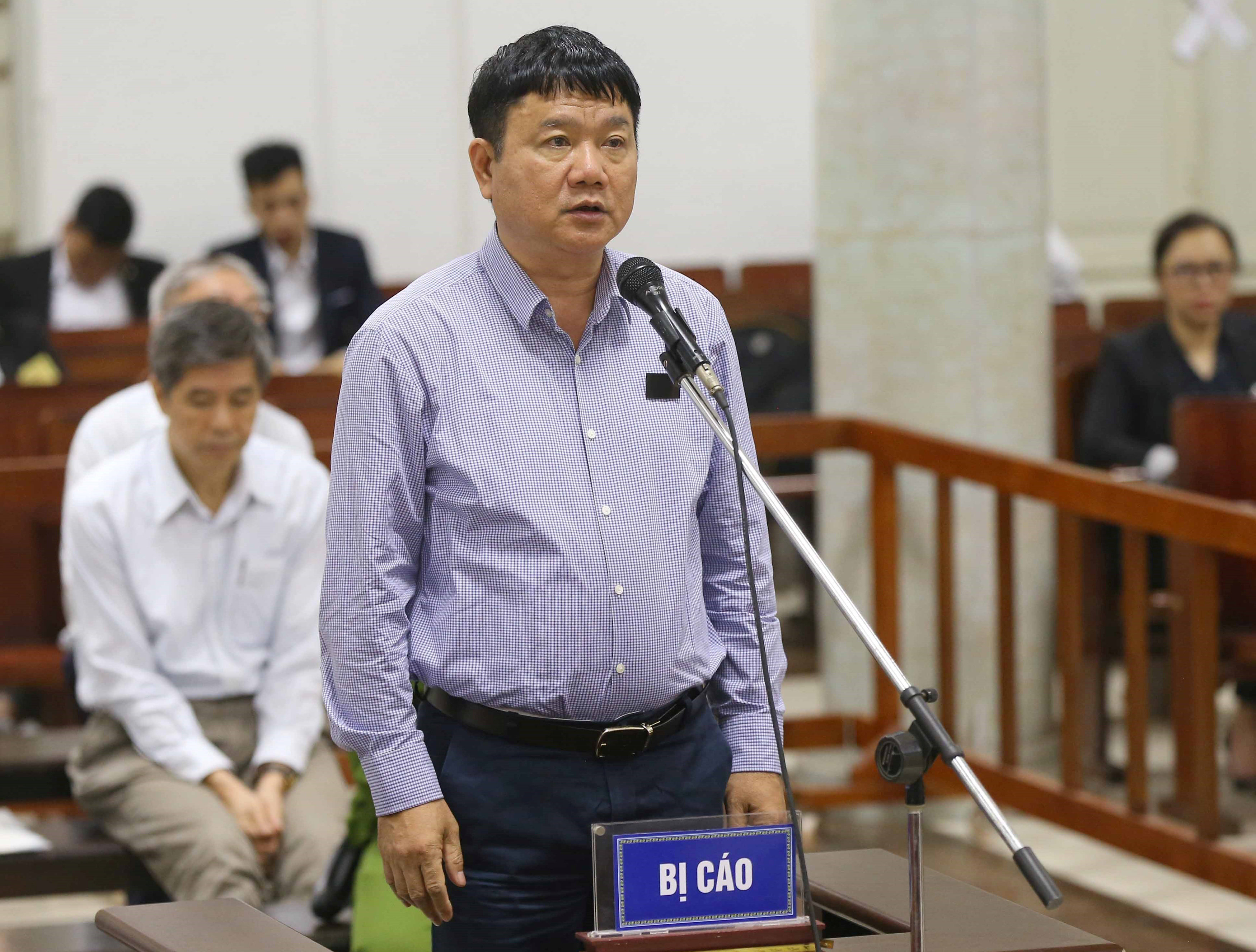 Former Vietnam politburo member back in court on suspicion of corruption