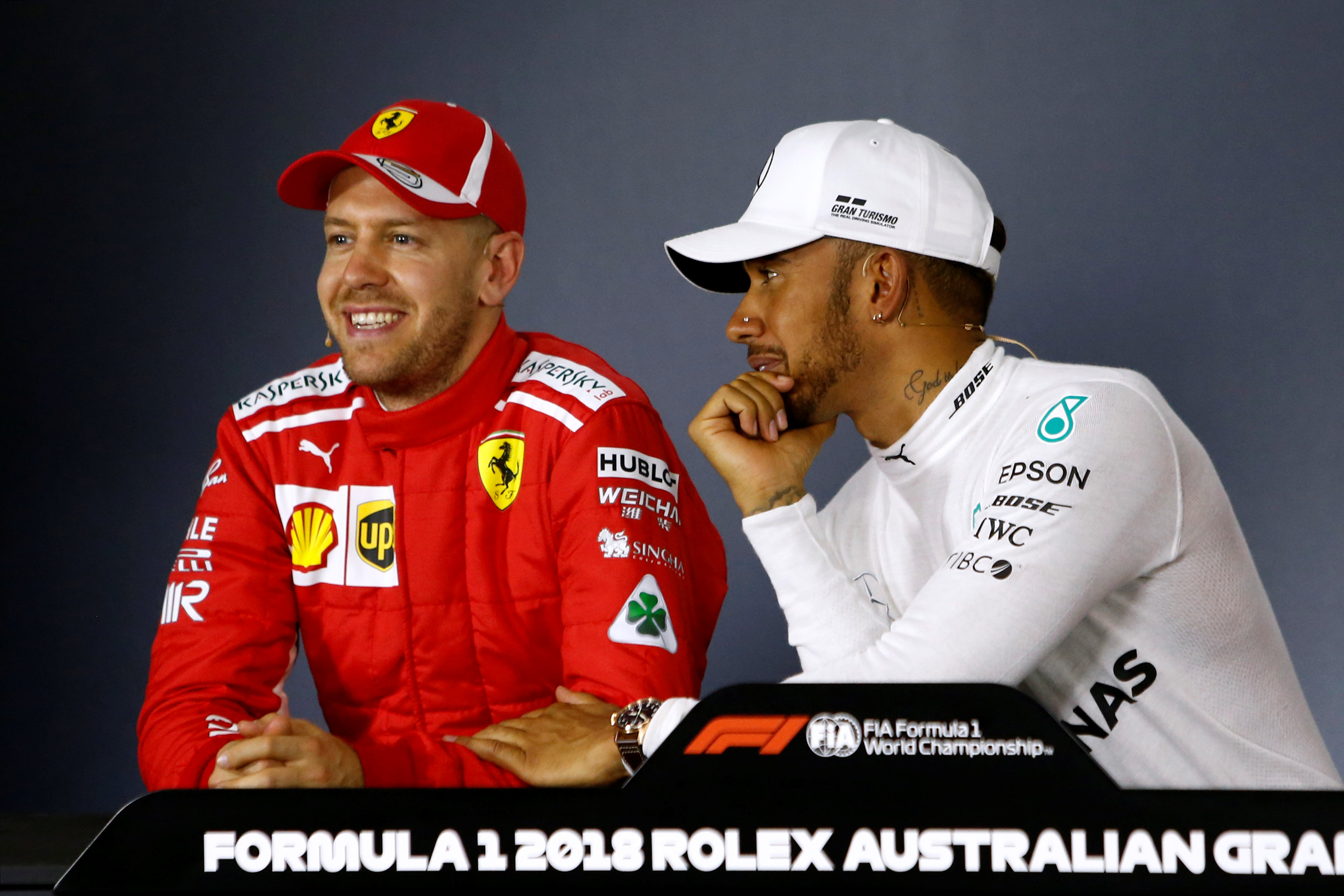 F1: Beaming Hamilton burns Vettel with 'smile' jibe