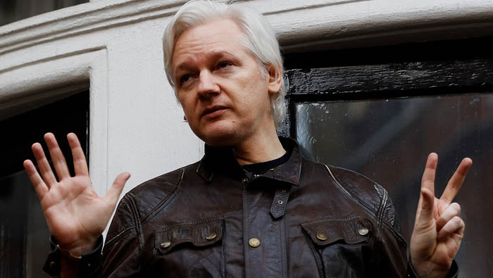 UK minister says Assange should turn himself in