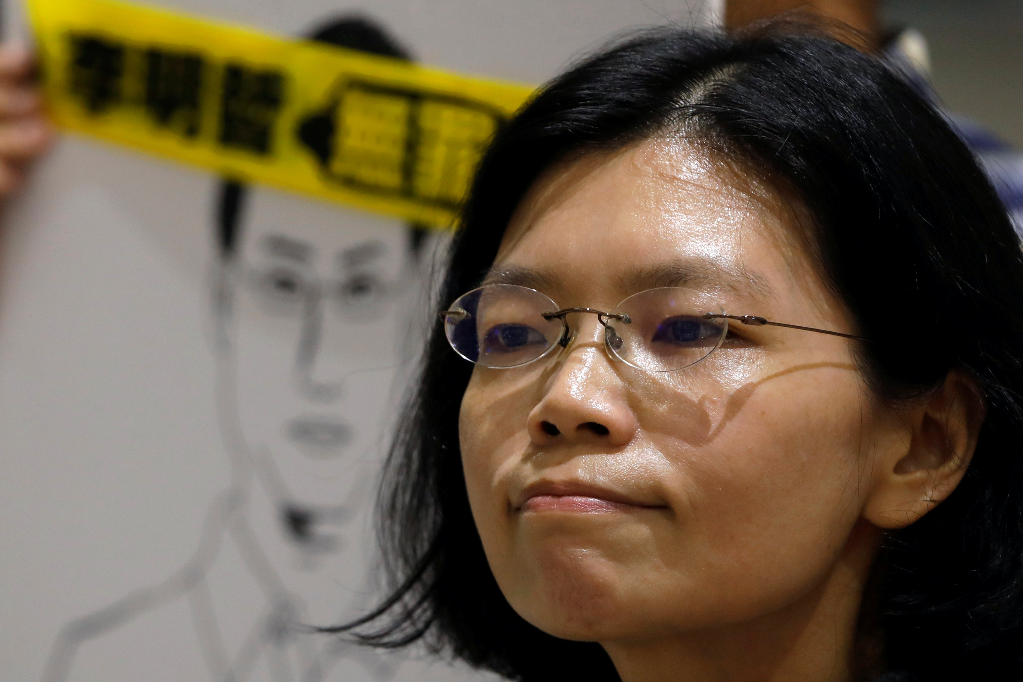 Wife of Taiwan activist jailed in China says he can't send letters