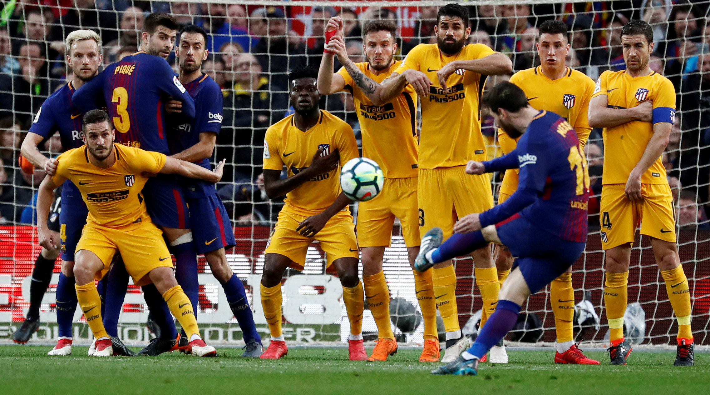 Football: Messi gem lifts Barca eight points clear of Atletico