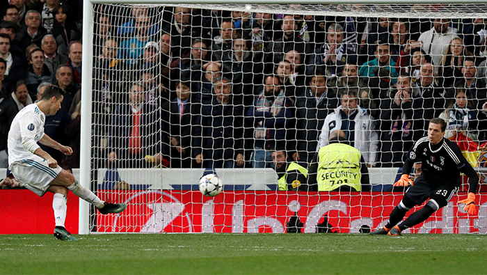 Football: Ronaldo penalty sends Real through after thrilling Juve fightback