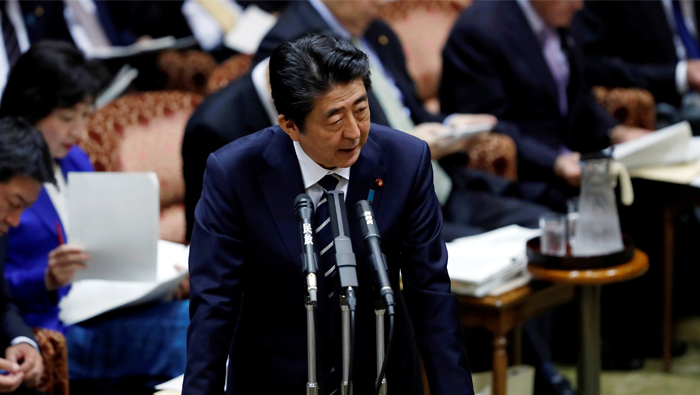 Abe's rating falls in media poll amid scandal woes