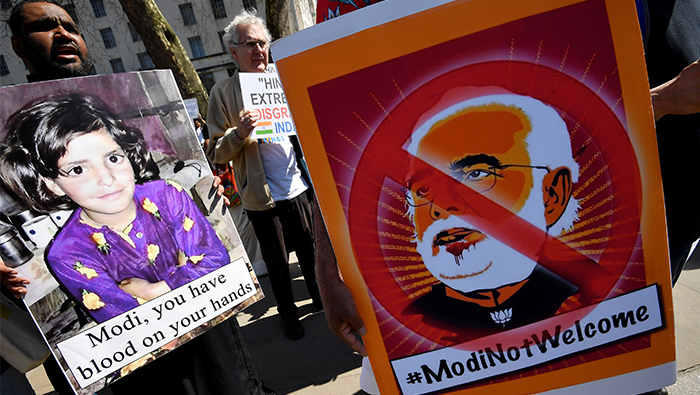Indian Prime Minister Narendra Modi confronted by angry protests in London