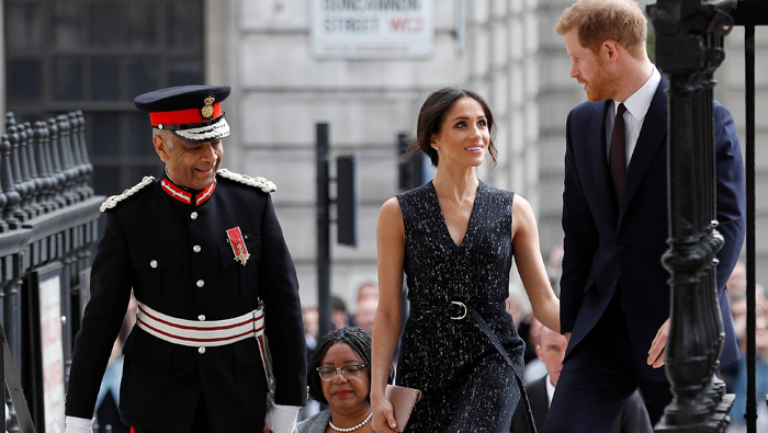 UK's Prince Harry and Meghan Markle attend memorial service for murdered black teenager