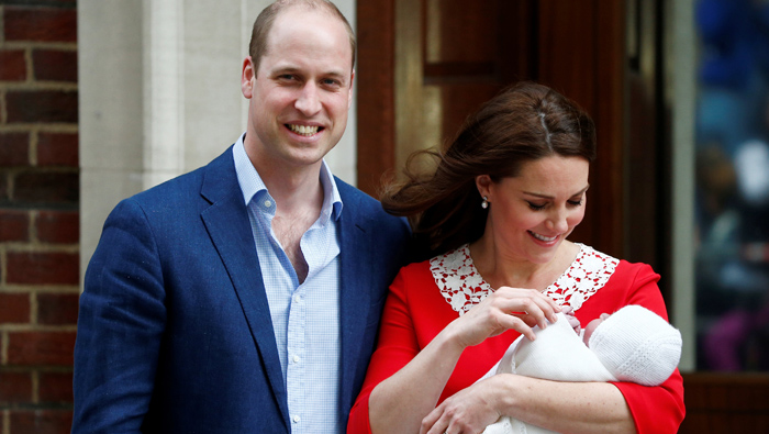 Smiling Prince William and Kate leave hospital with newborn son