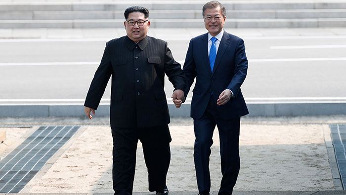 North, South Korea aim for end of war, 'complete denuclearisation' after historic summit