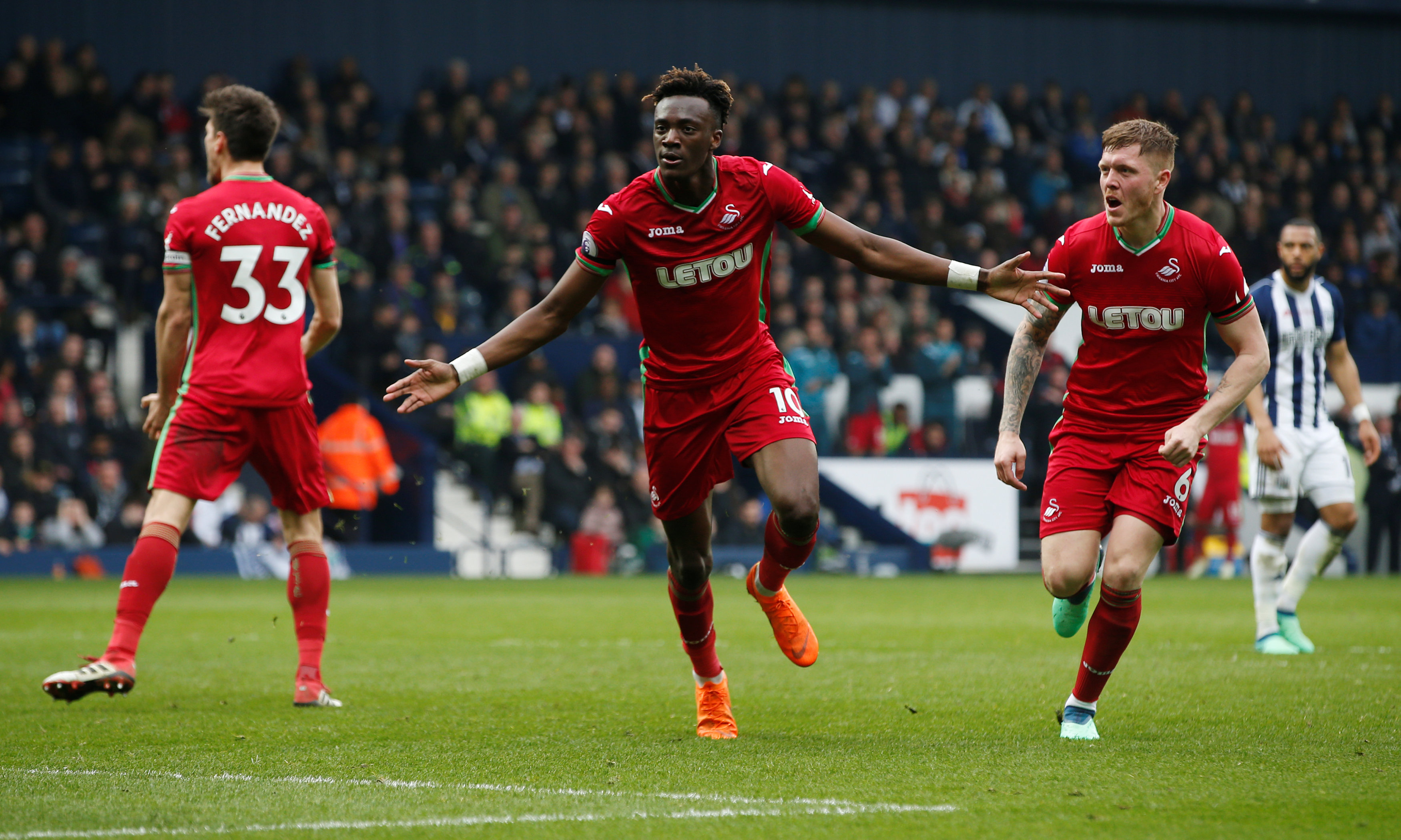 Football: Abraham strikes as Swansea hold West Brom