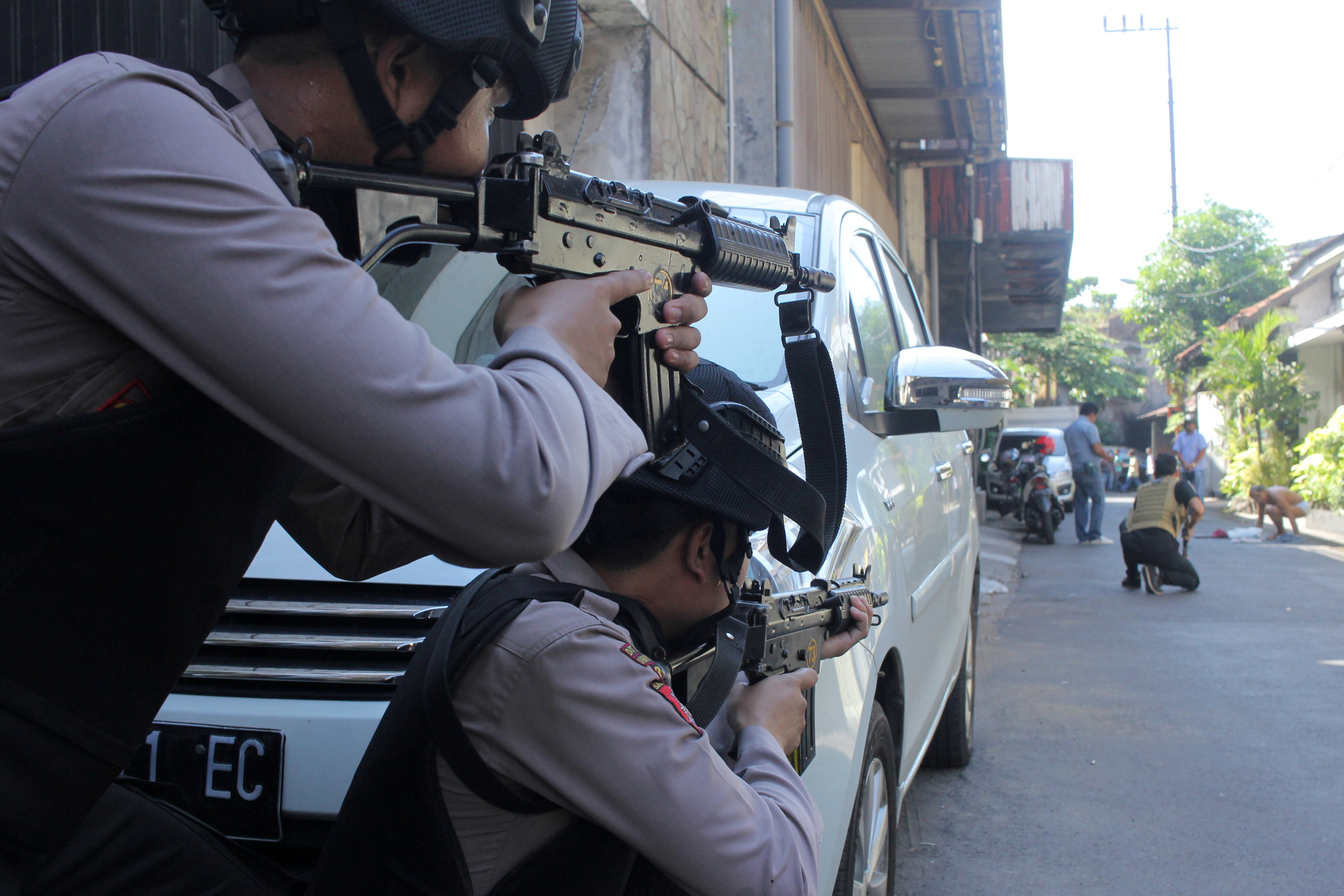 Militant family uses child in suicide attack on Indonesian police