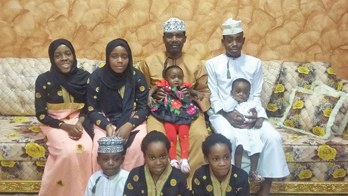 Living with three sets of twins in Oman