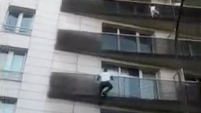 France offers citizenship to Malian immigrant who scaled building to save child