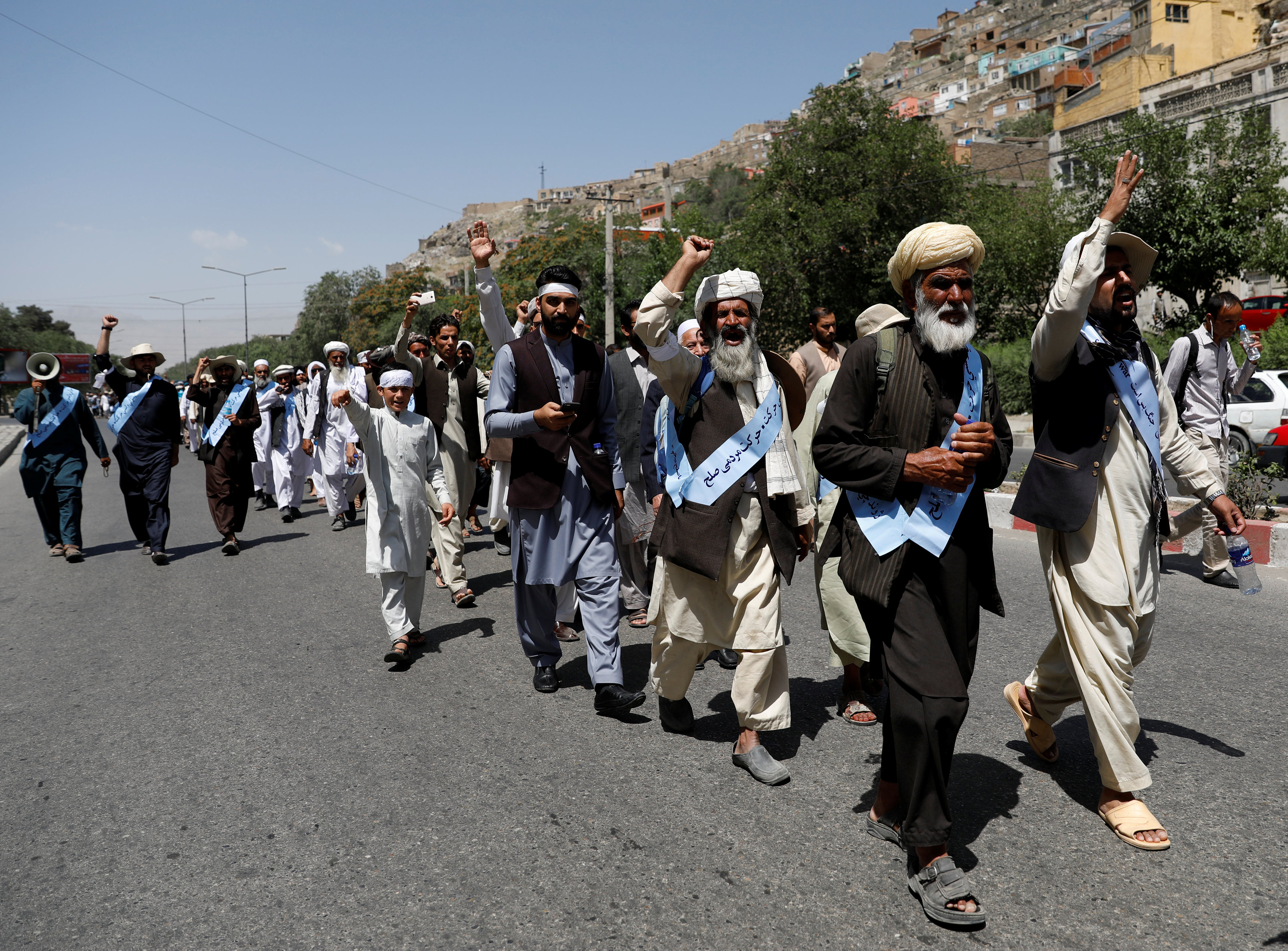 Afghans 'tired of war', say peace marchers in Kabul