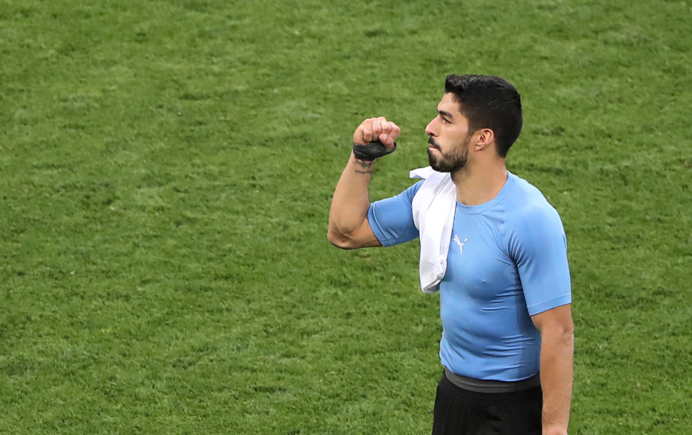 Football: Vintage Suarez on the spot as Uruguay go through