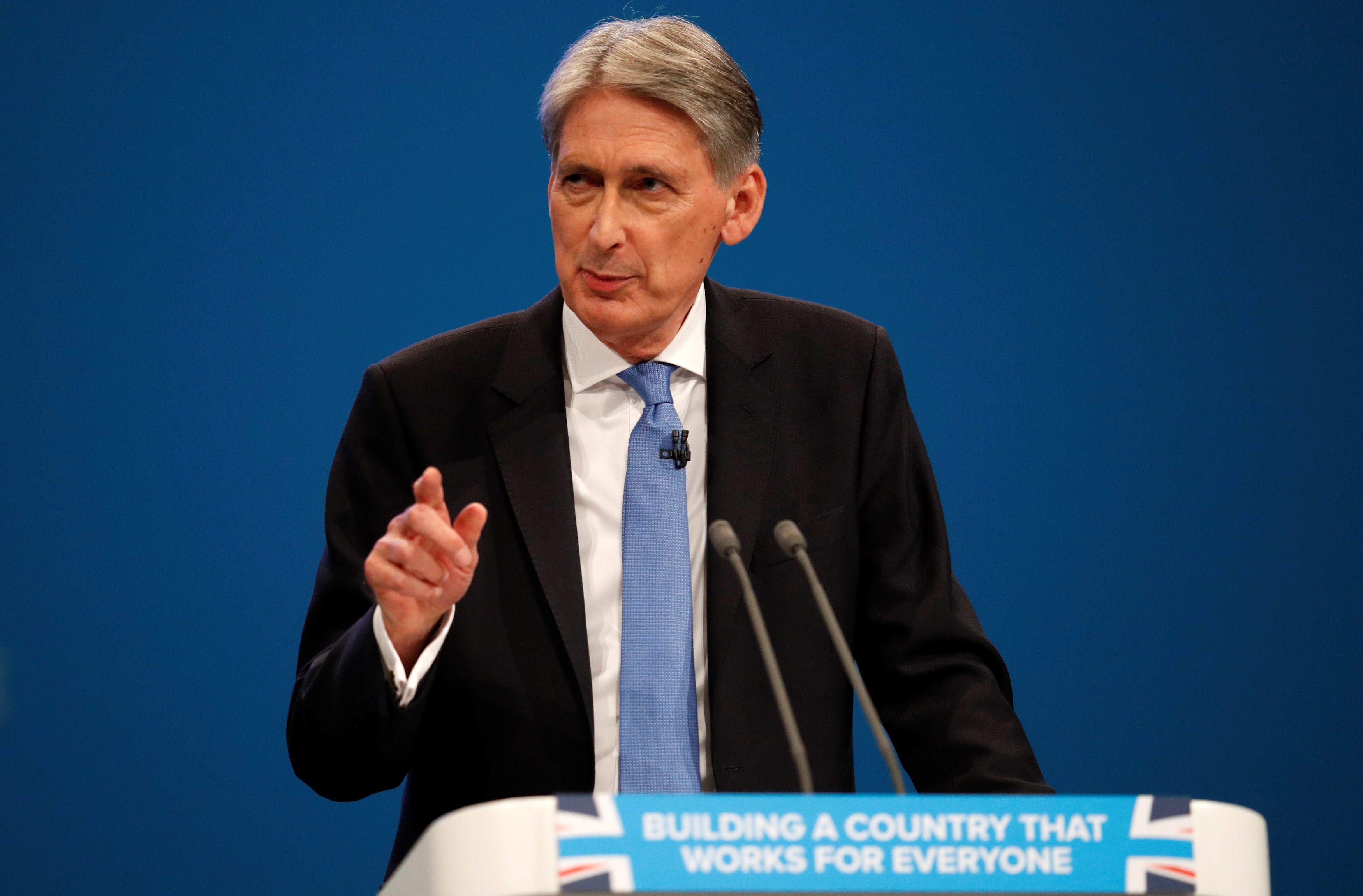 Britain committed to free trade, Hammond tells China