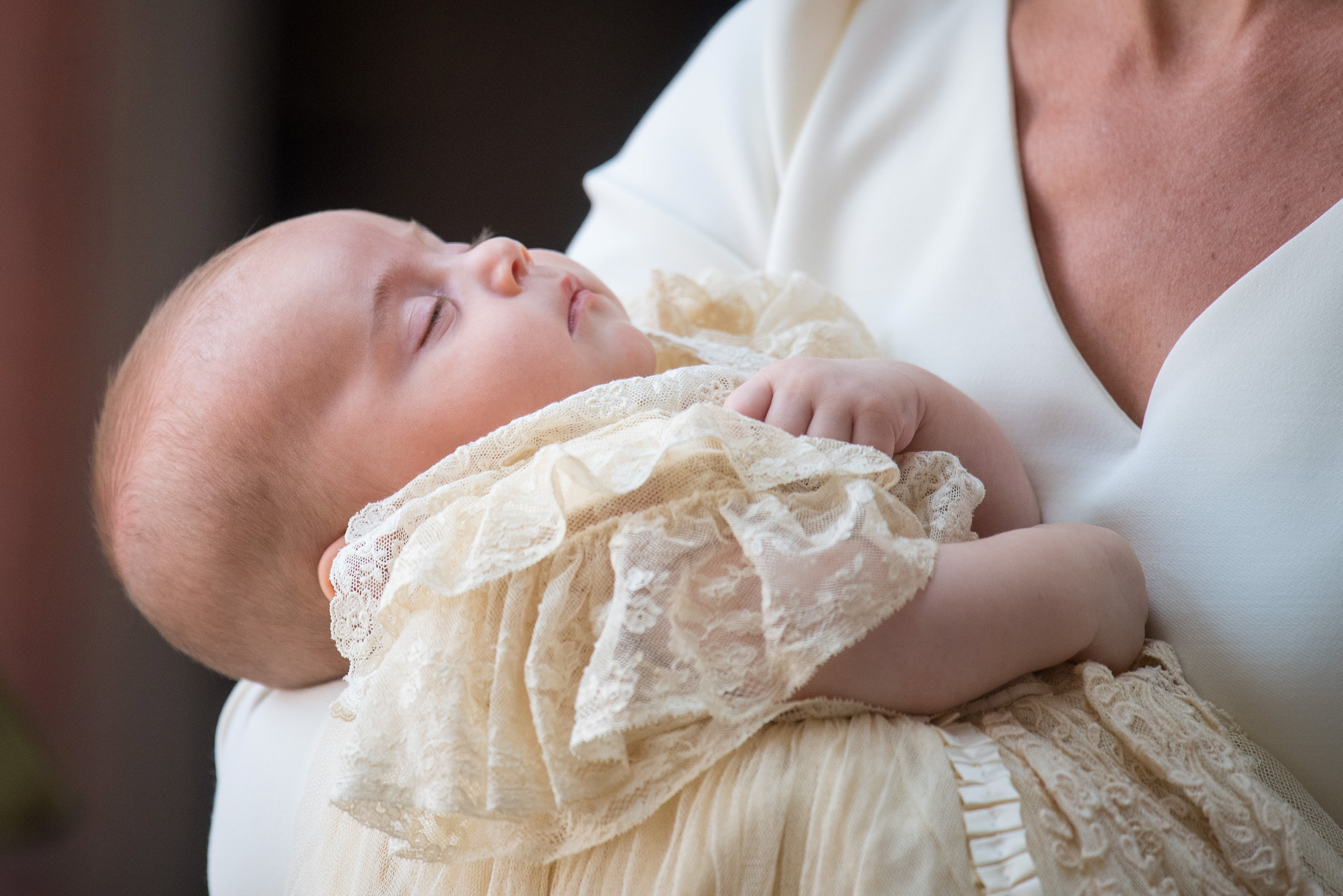 UK queen misses christening of William and Kate's baby son