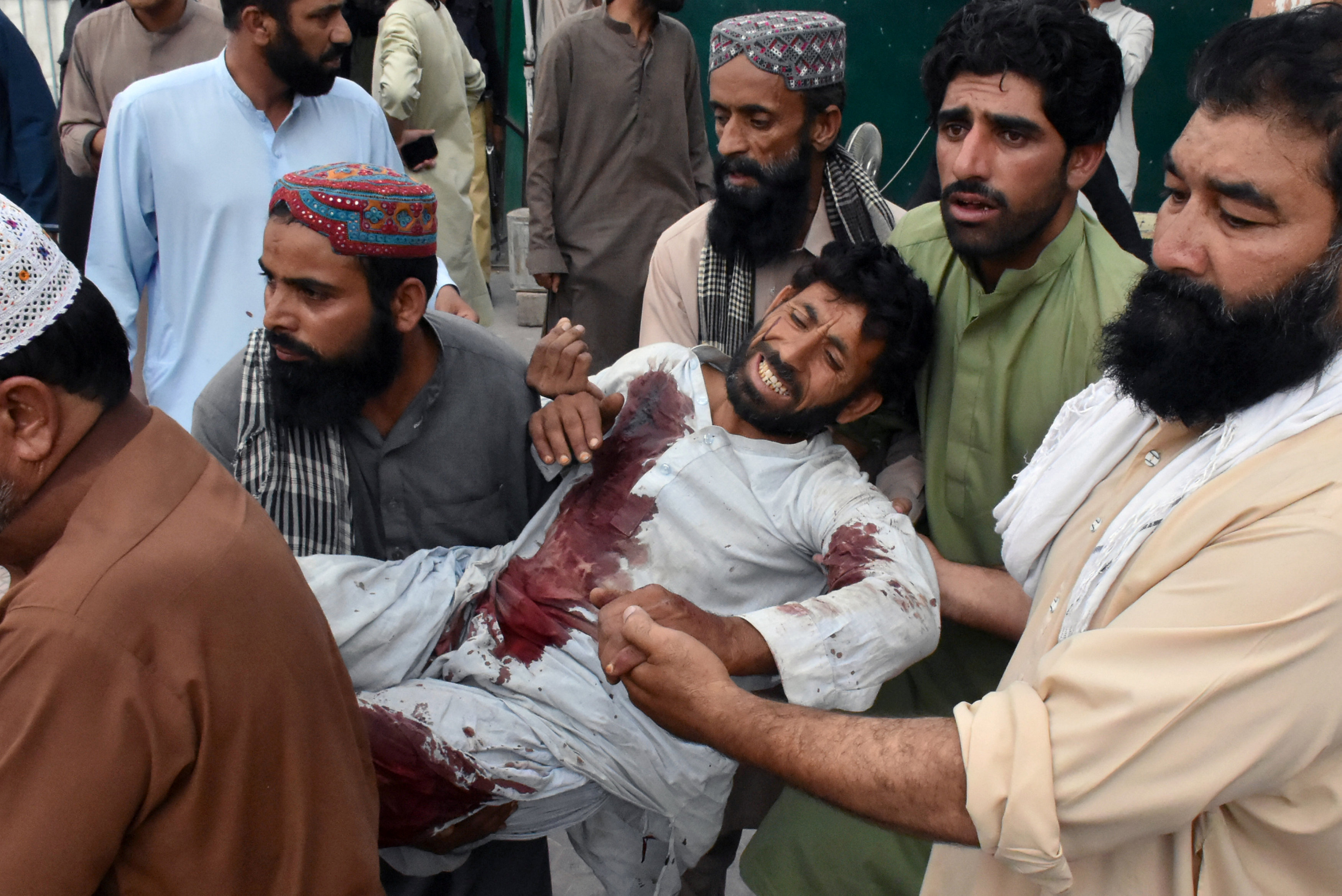 Suicide bomber kills 128 in attack on Pakistani election rally