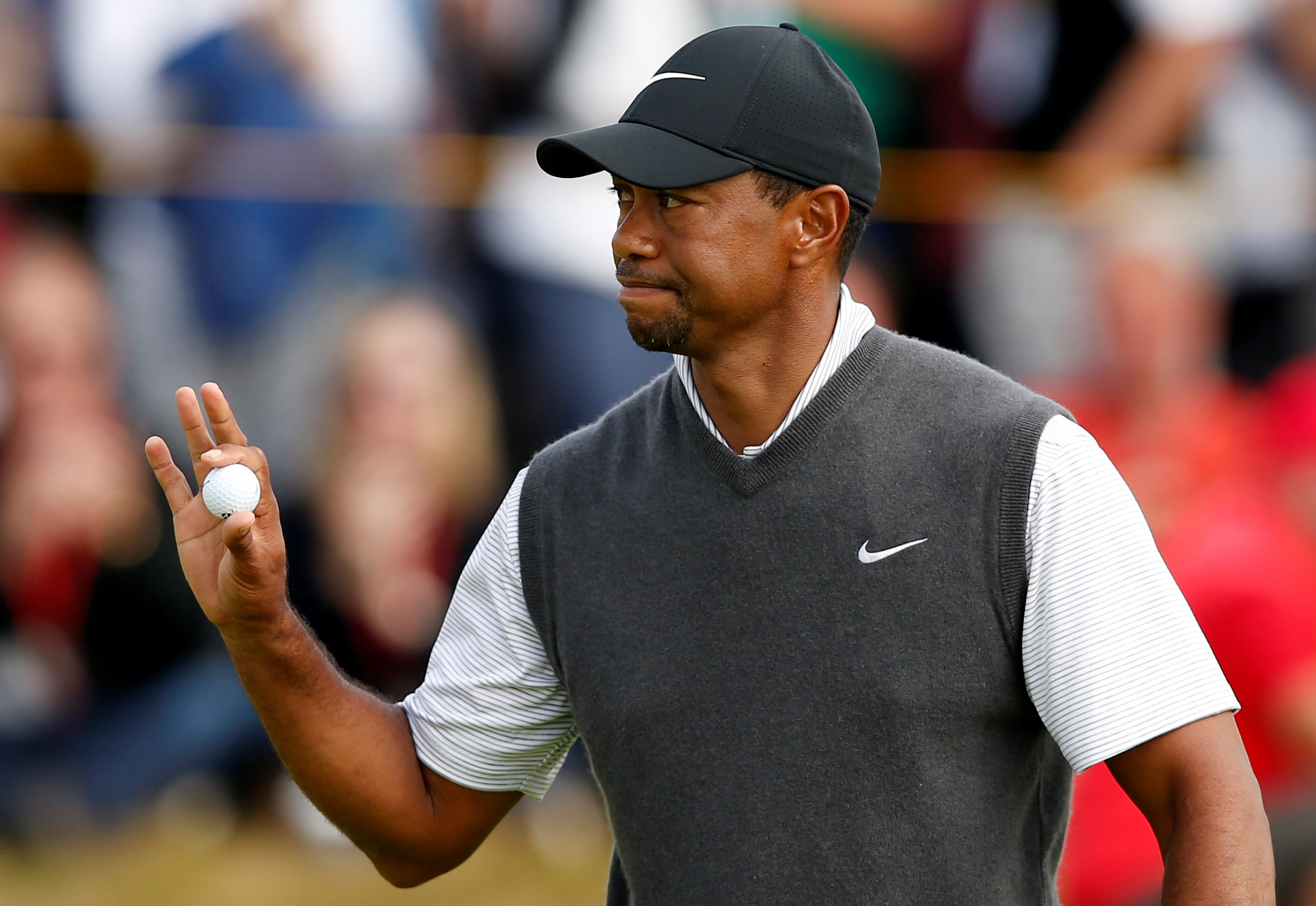 Woods charges into contention with third-round 66 at Carnoustie