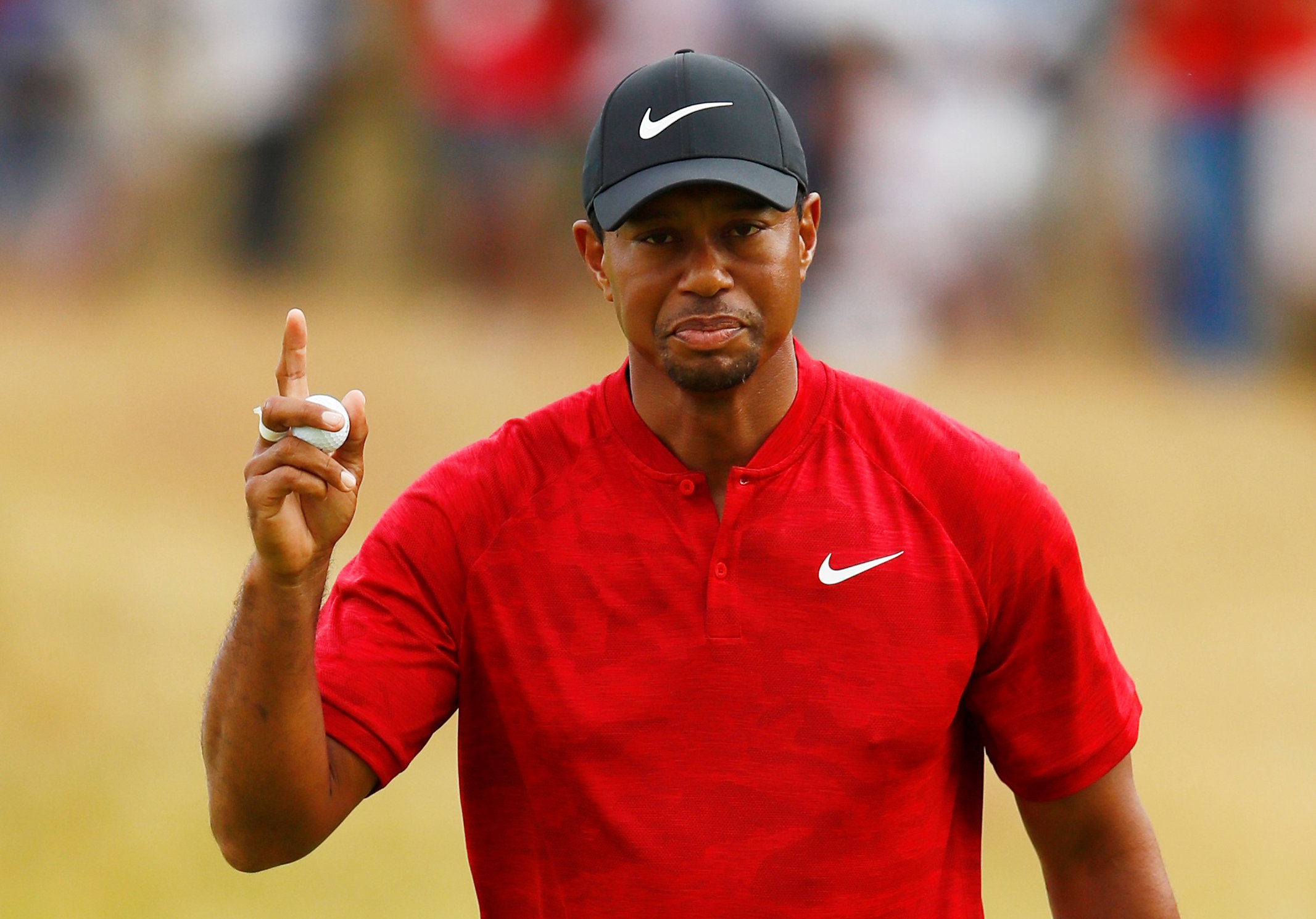 Golf: Woods leads as British Open heads for thrilling finish