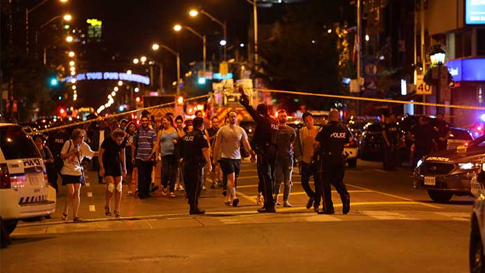 Gunman kills two, injures 12 on bustling Toronto avenue: Canadian police