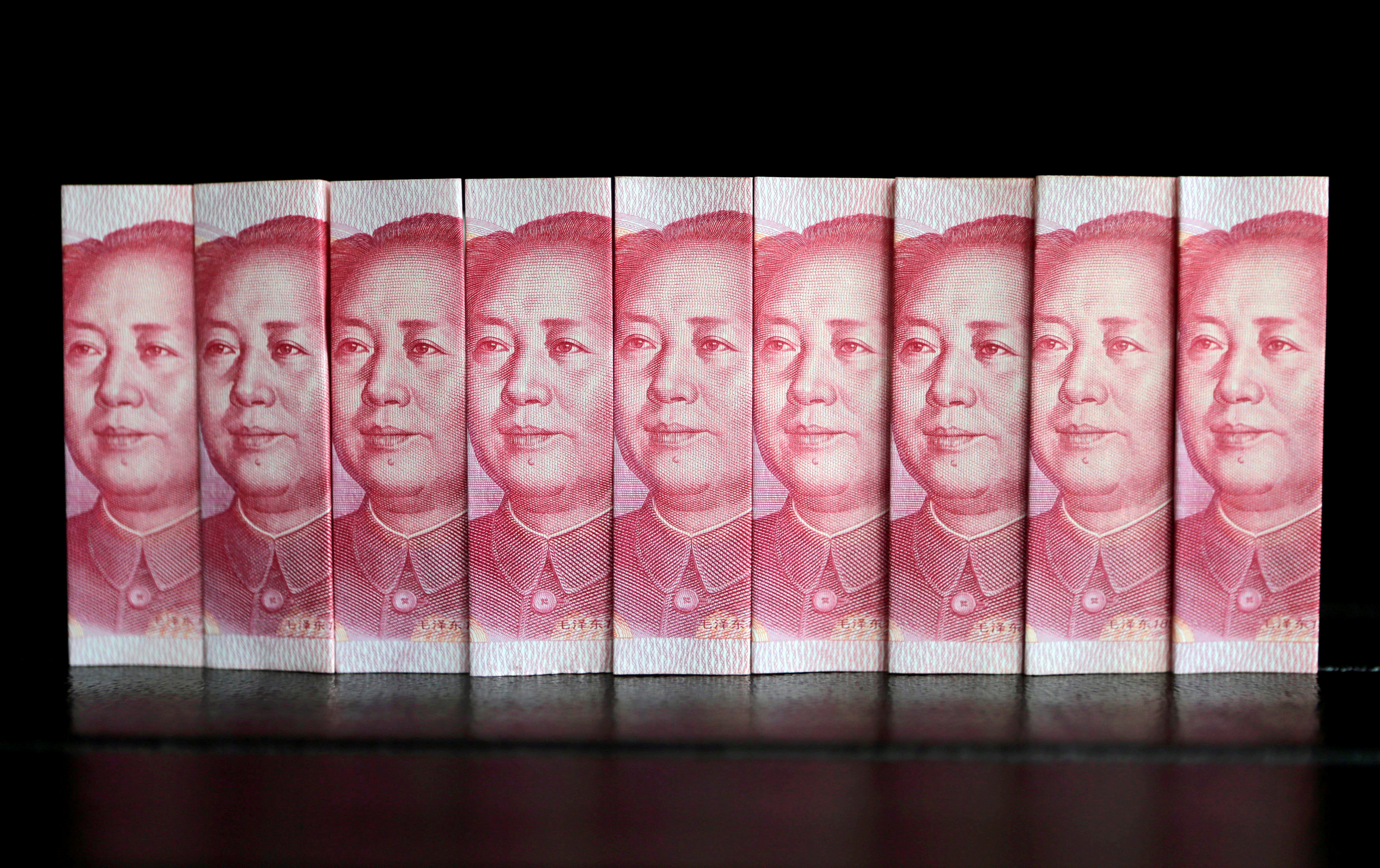 China says it won't devalue currency to bolster exports