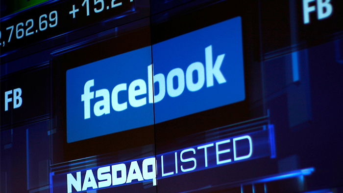 Facebook stock falls 24 pct on forecast for slowing growth, rising expenses