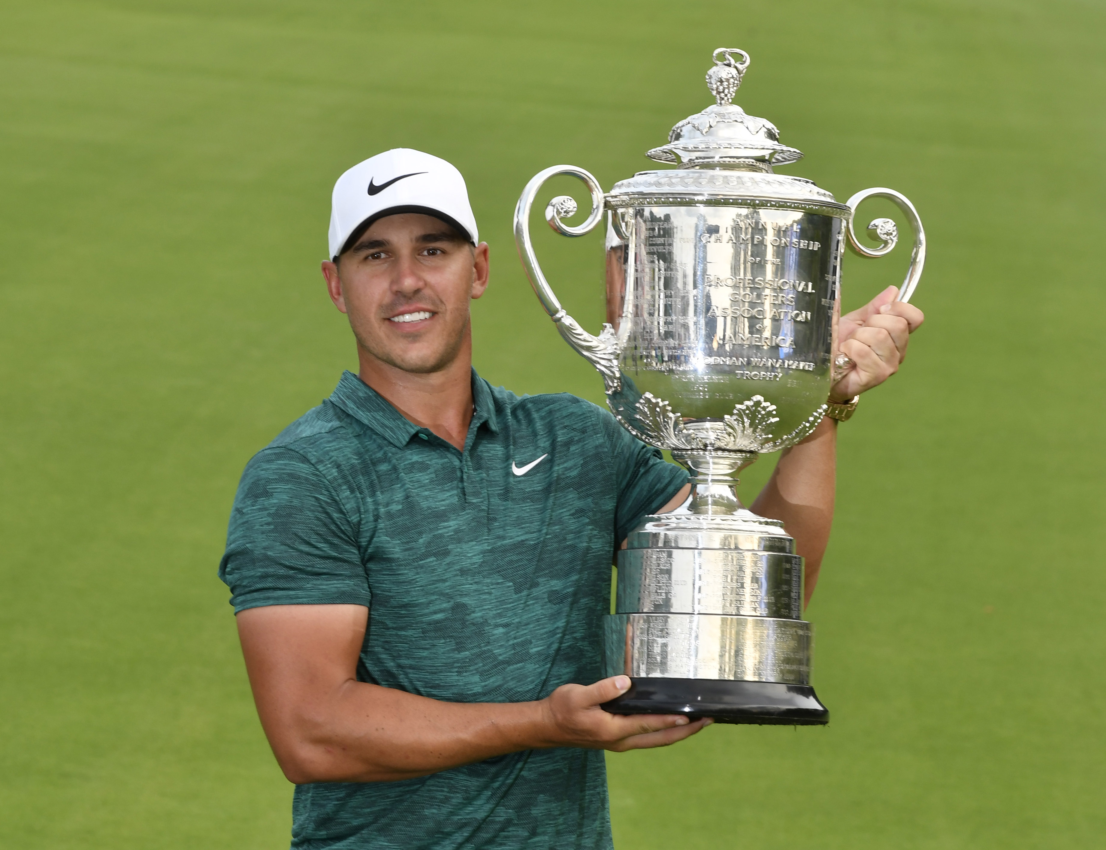 Koepka holds off Woods to win PGA Championship